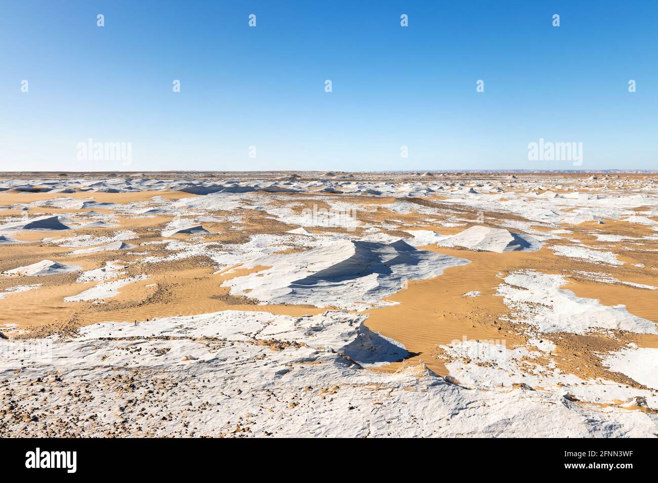 Awesome White Desert on the blue sky background. Stock Photo