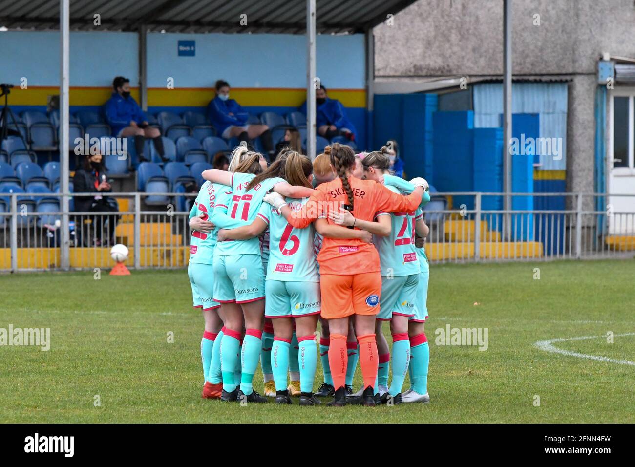 Port Talbot, Wales. 11 April, 2021. Swansea City Ladies team huddle prior to kick-off in the Orchard Welsh Premier Women's League match between Port Talbot Town Ladies and Swansea City Ladies at the Victoria Road Stadium in Port Talbot, Wales, UK on 11, April 2021. Credit: Duncan Thomas/Majestic Media. Stock Photo
