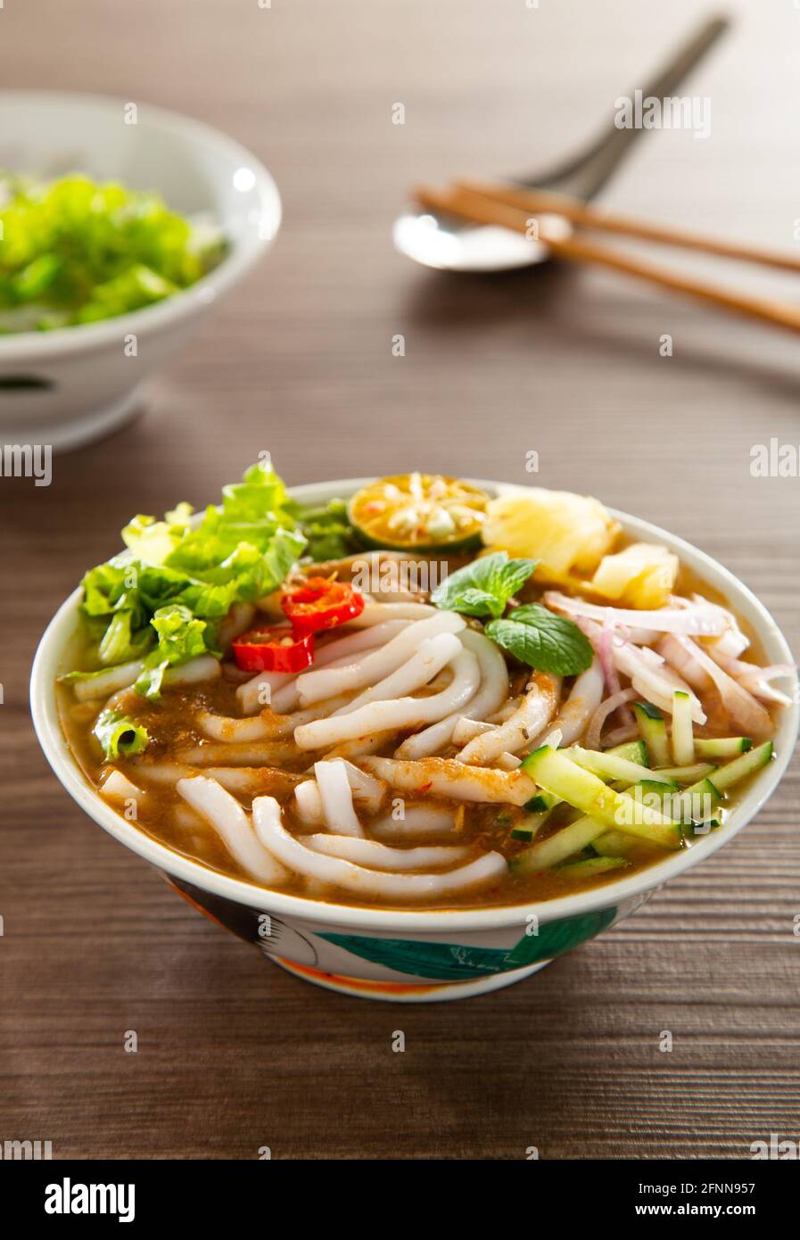 Assam Laksa (Noddle in Tangy Fish Gravy) is a Special Malaysian Popular Food Stock Photo