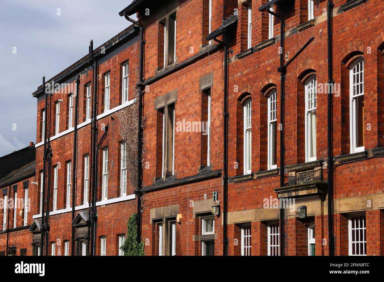 Leeds, UK residential street in Hyde Park district. Typical English