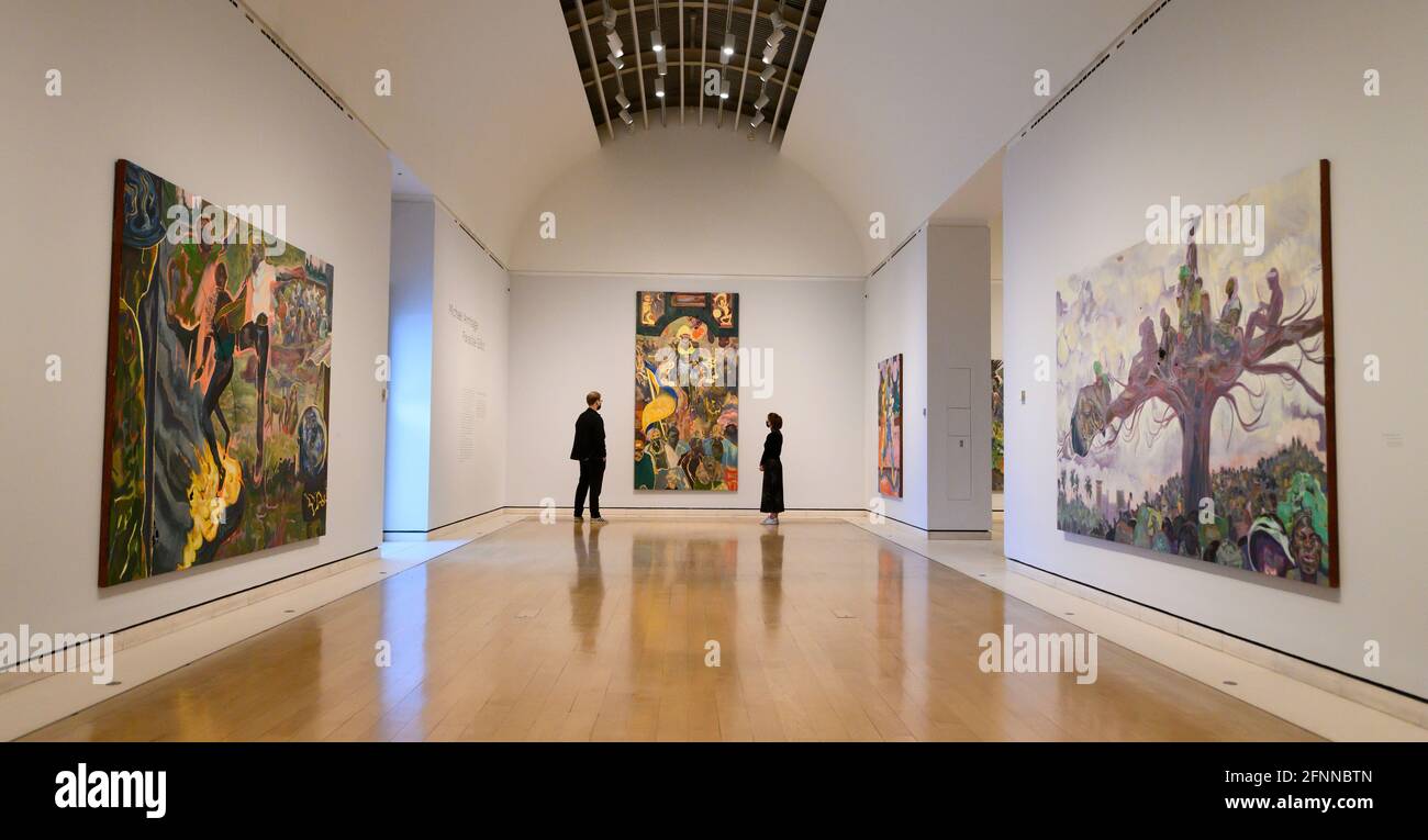 Royal Academy of Arts, London, UK. 18 May 2021. Michael Armitage: Paradise Edict. In his paintings, Armitage reflects on his experiences in Kenya and on current events, while drawing on contemporary East African art and European art history. The exhibition features landscapes, allegorical figures and paintings inspired by the 2017 Kenyan general elections. Armitage graduated from the RA Schools in 2010 and now works between Nairobi and London. Credit: Malcolm Park/Alamy Live News. Stock Photo