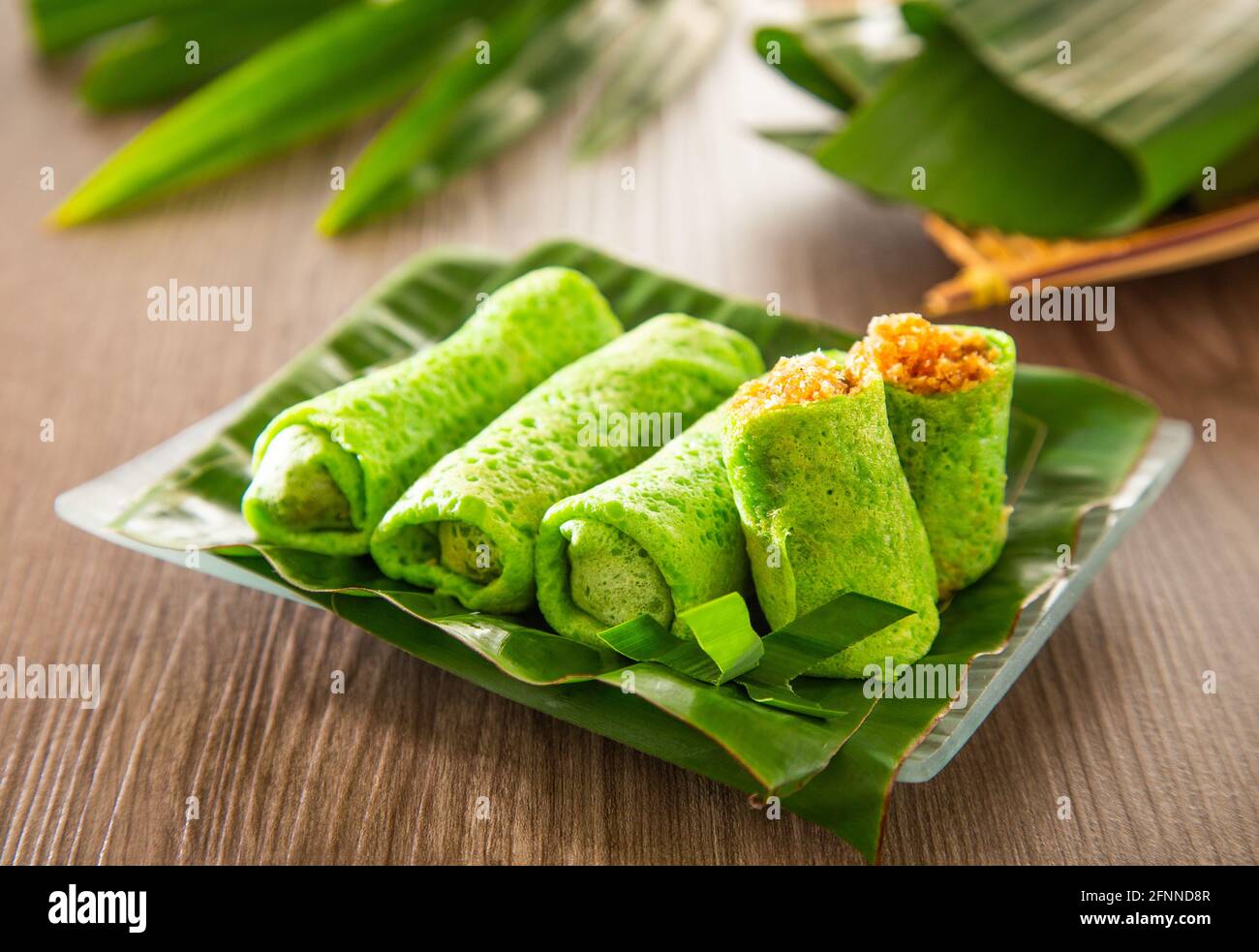 Malaysia sweet dessert with coconut known as kuih ketayap Stock Photo