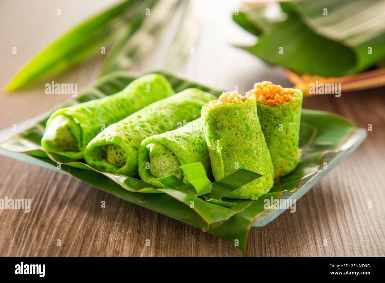 Malaysia sweet dessert with coconut known as kuih ketayap Stock Photo