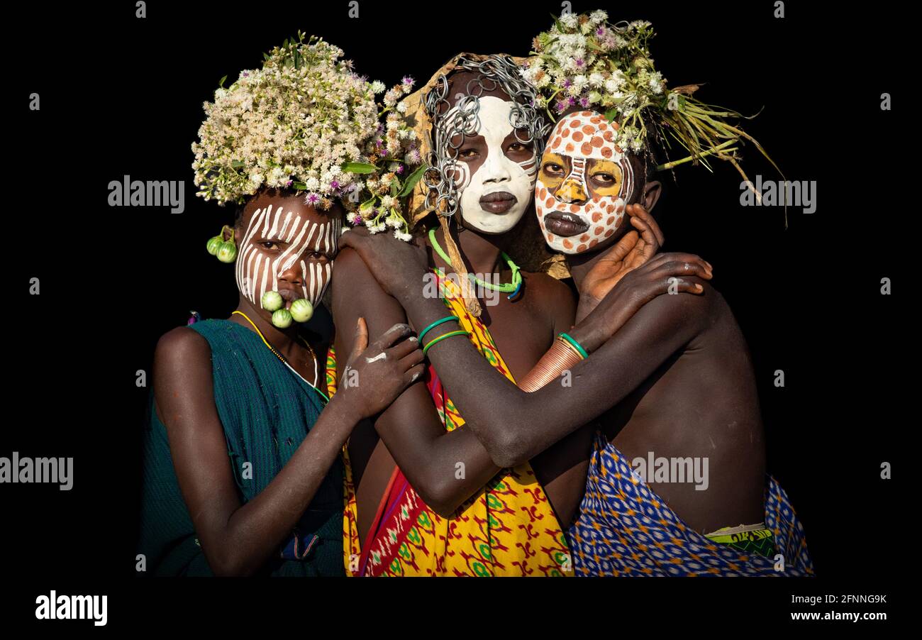 The tribe believe in a sky god named Tumu. ETHIOPIA: A BRITISH photographer has captured stunning pictures of the Suri tribe who adorn themselves in f Stock Photo