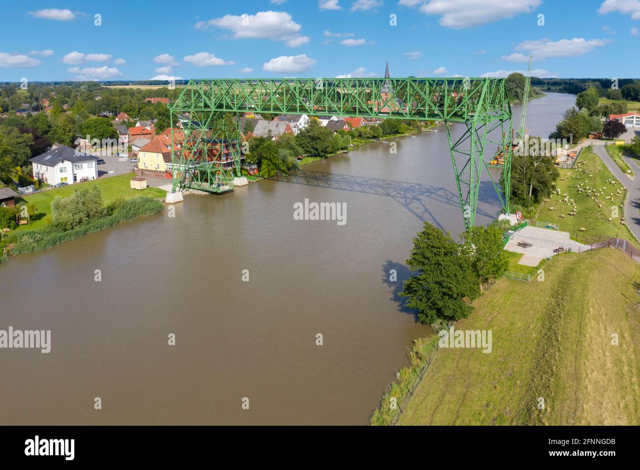 Aerial view with the transporter bridge Osten-Hemmoor over river Oste, Osten, Lower Saxony, Germany, Europe Stock Photo