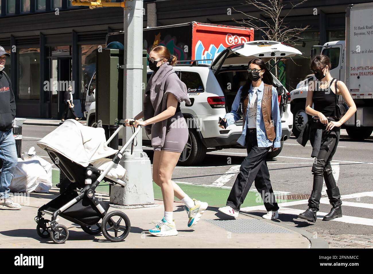 New York - NY - 20210408 - Gigi Hadid and Bella Hadid Take Baby Khai for a  Walk in NYC NohoNY - Gigi HadidBella Hadid - Janet Mayer Stock Photo - Alamy