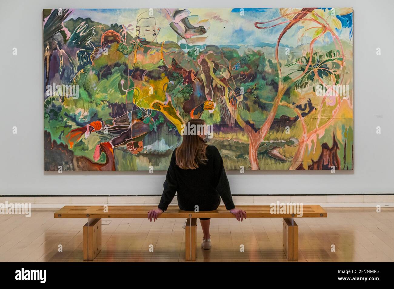 London, UK. 18th May, 2021. The Paradise Effect, 2019 - Michael Armitage: Paradise Edict at the Royal Academy - he reflects on his experiences in Kenya and on current events, while drawing on contemporary East African art and European art history. The exhibition spans the last seven years of Armitage's work, featuring landscapes, allegorical figures and paintings inspired by the 2017 Kenyan general elections. The RA reopens its London spaces after easing of the restrictions of the third Coronavirus Lockdown. Credit: Guy Bell/Alamy Live News Stock Photo
