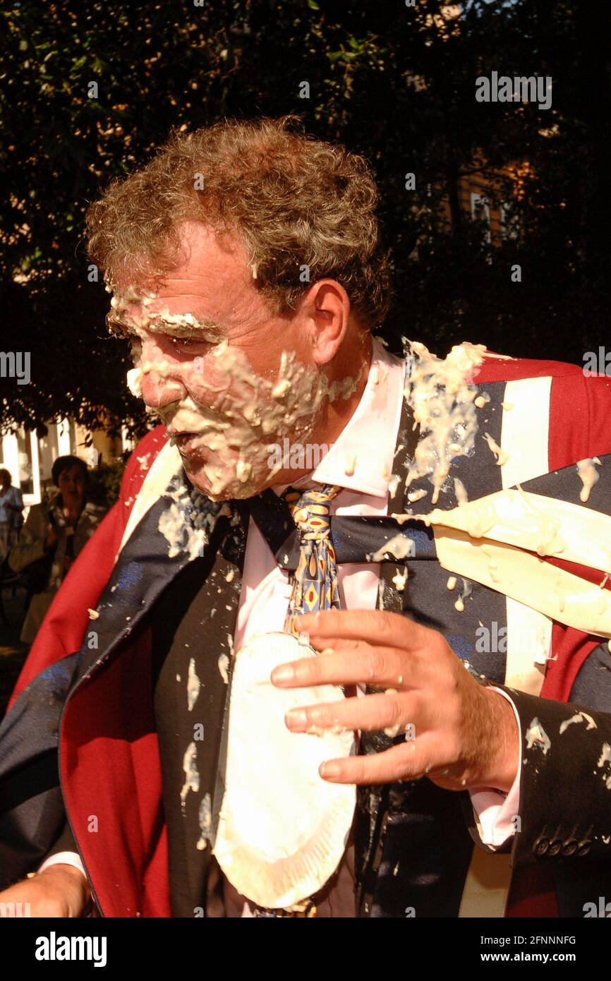 Jeremy Clarkson, being hit with a pie thrown by environmental protester who was protesting against Clarkson views about manmade climate change. Jeremy Clarkson just received a honorary degree from Oxford Brookes University.  Oxford Brooks University, Oxford, UK.  12 Sep 2005 Stock Photo