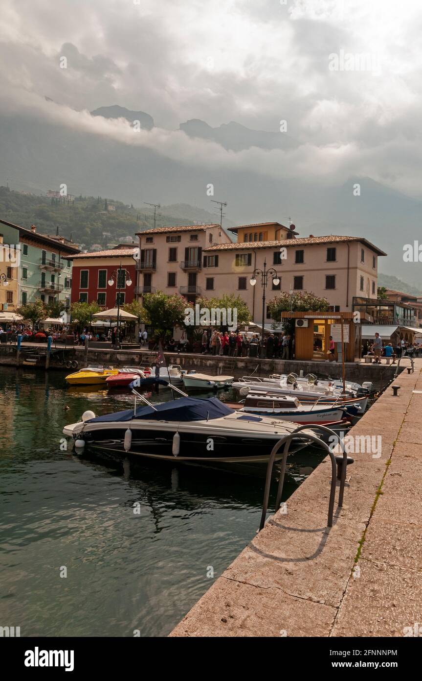 Il porto d'inverno ( port) and marina in the medieval town of Malcesine on the eastern shore of Lake Garda in the Veneto region of northern Italy Stock Photo