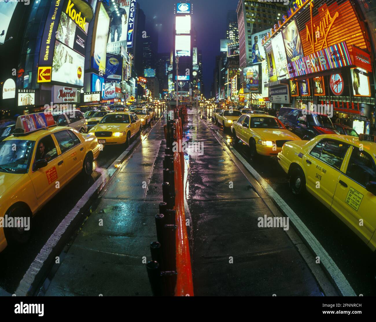 2004 HISTORICAL YELLOW TAXI CABS (©FORD MOTOR CO 2000) TIMES SQUARE MIDTOWN MANHATTAN NEW YORK CITY USA Stock Photo
