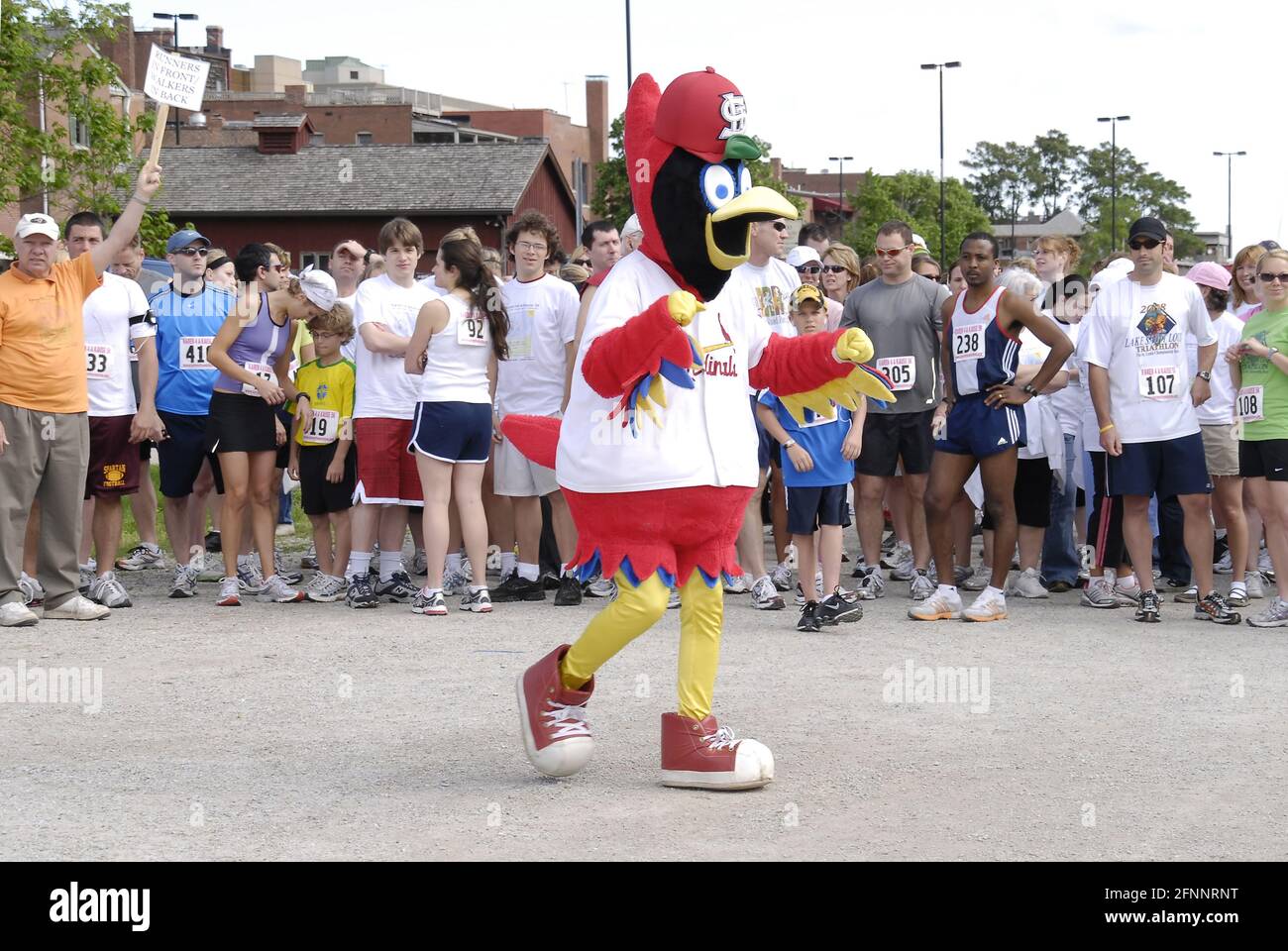 ST. CHARLES, UNITED STATES - May 10, 2009: Fred Bird, the mascot for the St. Louis Cardinals baseball team having some fun with the crowd at a charity Stock Photo