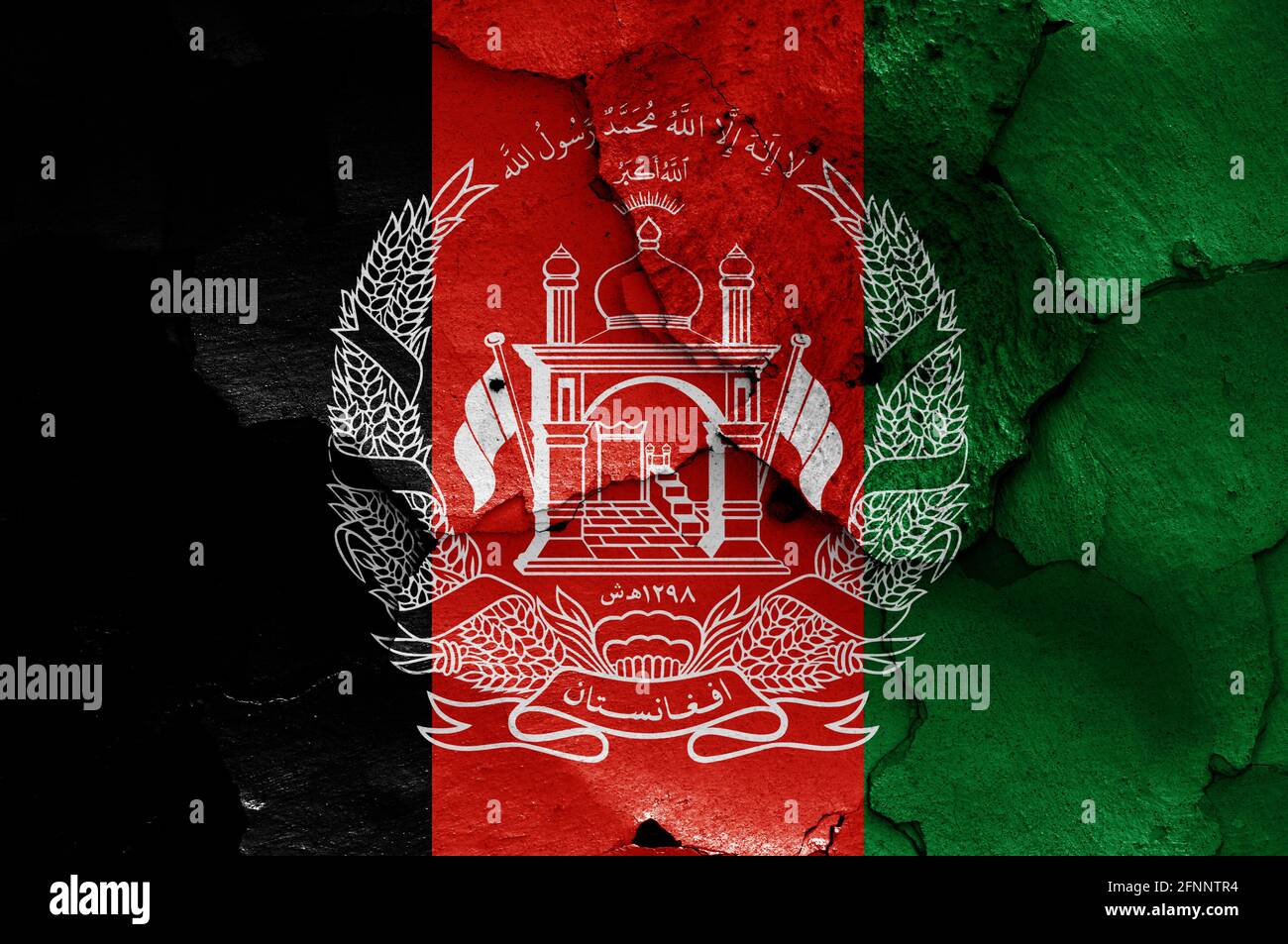 flag of Afghanistan painted on cracked wall Stock Photo