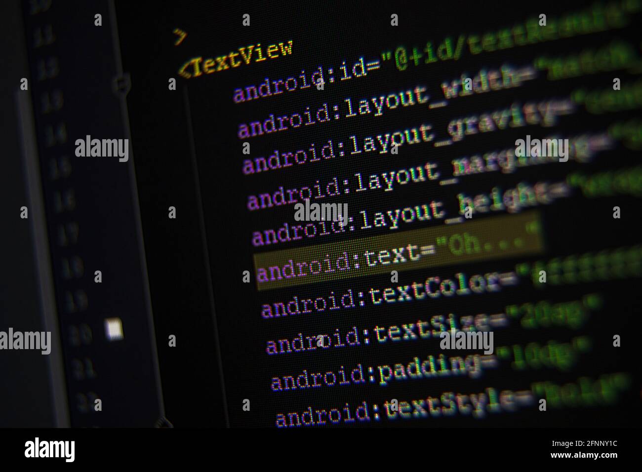 Android xml code on monitor screen from side Stock Photo - Alamy