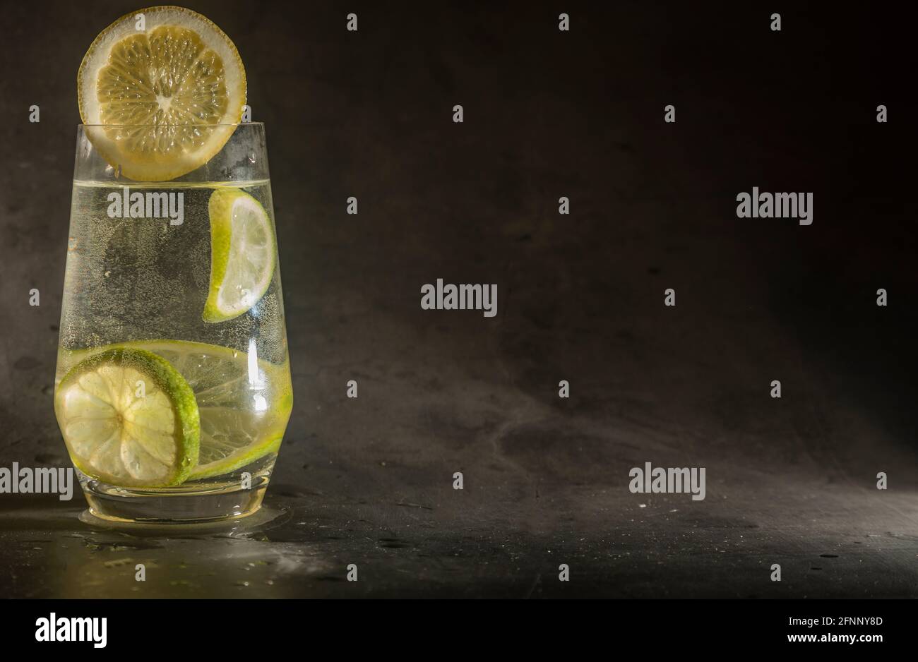 Ice Cube Falling Into Splashing Cuba Libre Cocktail Stock Photo