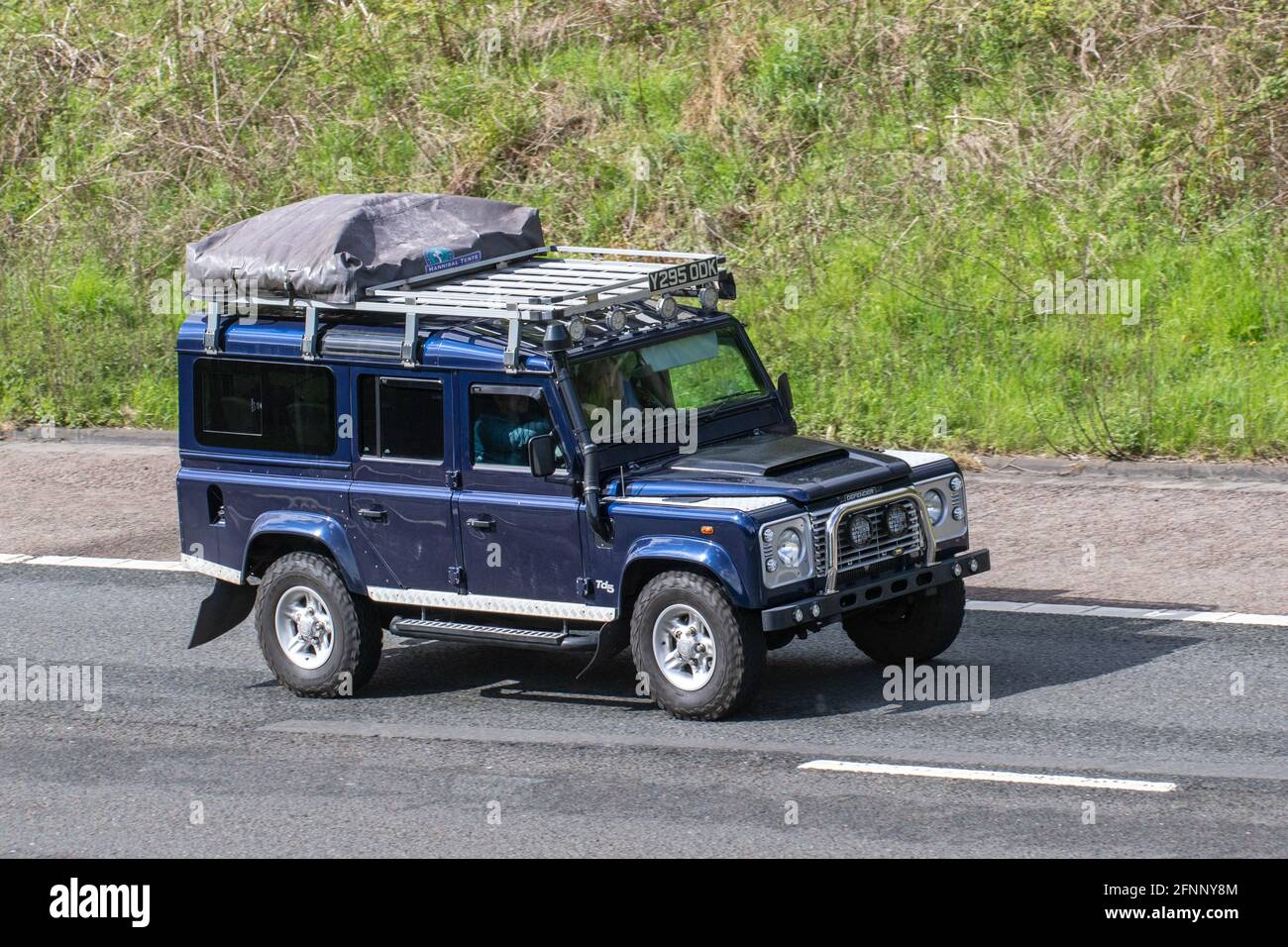 2001 Blue Land Rover Defender County Td5; Vintage  expedition leisure, British off-road 4x4, rugged off-road all-terrain overland rally adventure vehicle, LandRover Discovery Turbo Diesel UK Stock Photo