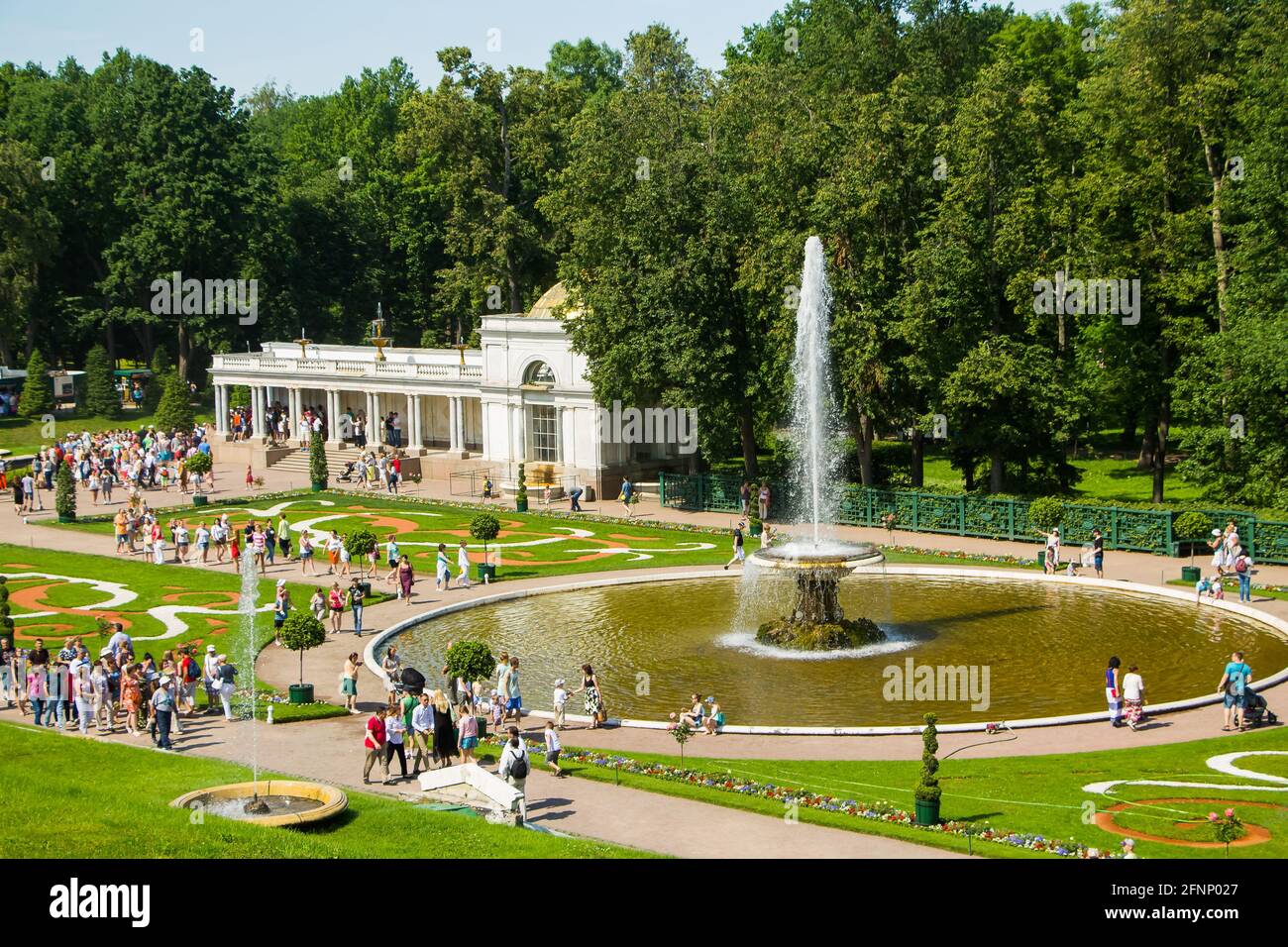 Peterhof, Russia: July 16, 2016 - the palace park. Celebration of the opening of fountains. Tourists visiting the landmark of St. Petersburg. Stock Photo