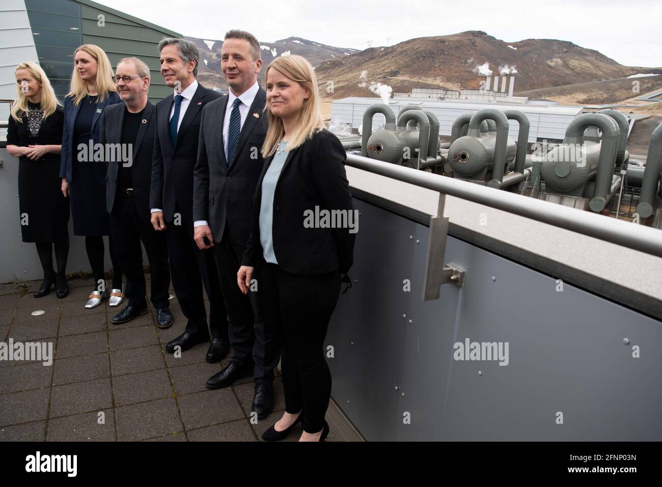 U.S. Secretary of State Antony Blinken stands alongside CEO of Reykjavik Energy Bjarni Bjarnason, and Icelandic Foreign Minister Gudlaugur Thor Thordarson, during a tour to the Hellisheidi Geothermal Plant, in Hengill, Iceland May 18, 2021. Saul Loeb/Pool via REUTERS Stock Photo