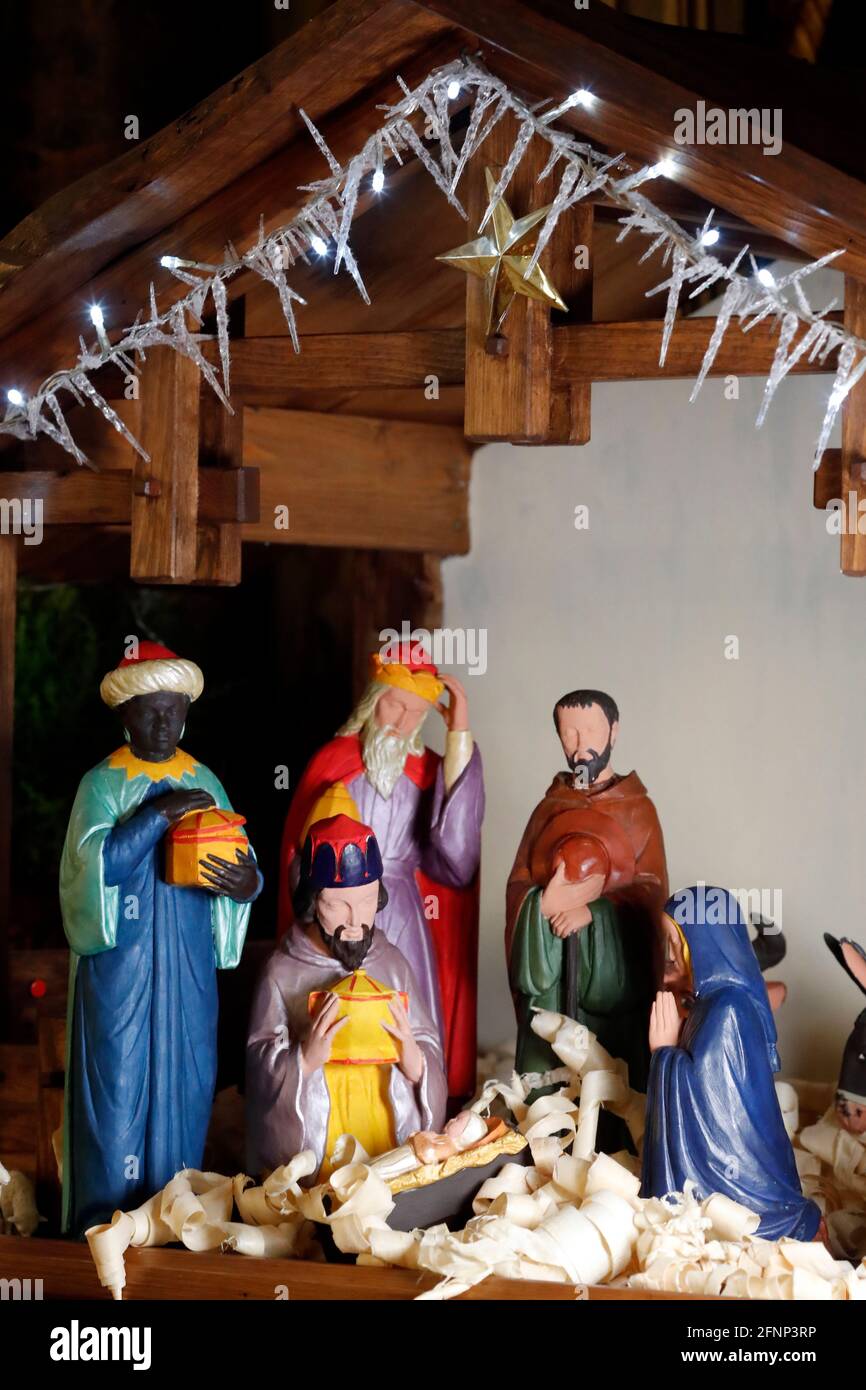Nativity scene. Christmas crib. The adoration of thee three Magi (named
