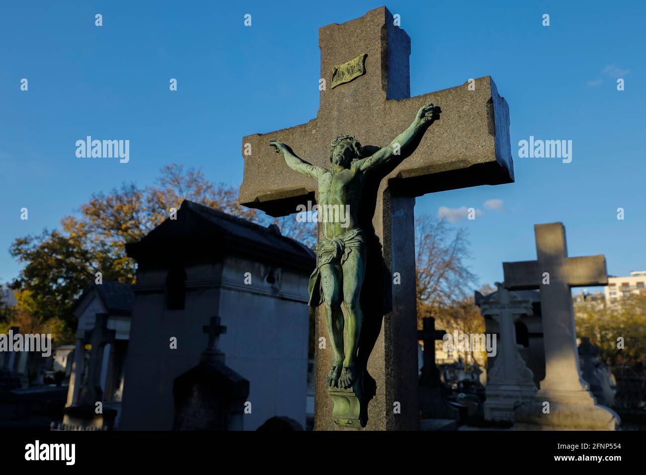 Montparnasse cemetery (French : cimetiere du Montparnasse), Paris, France. Cross Stock Photo