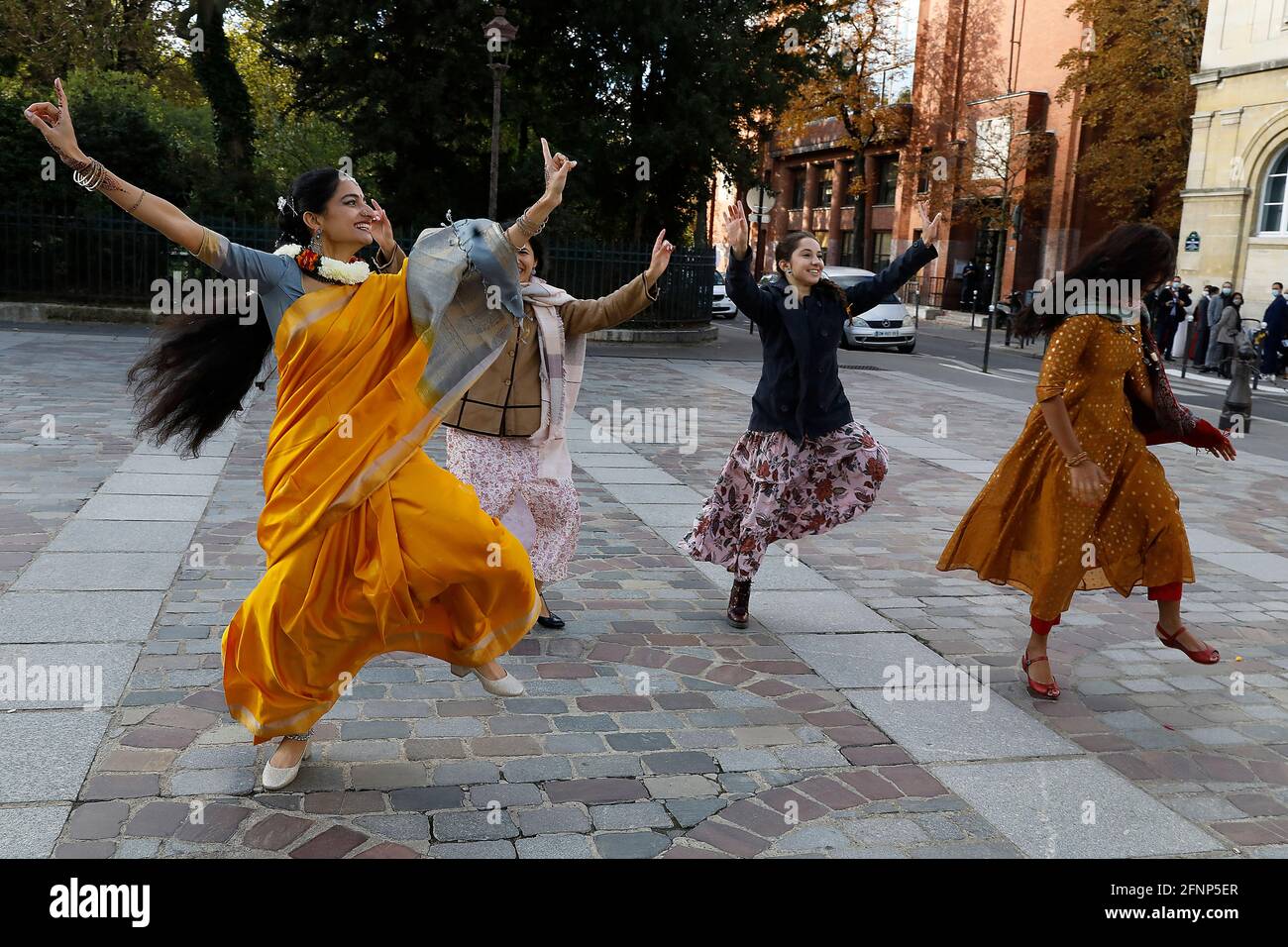 Multiracial mariage in Paris, France. Bollywood dancing Stock Photo