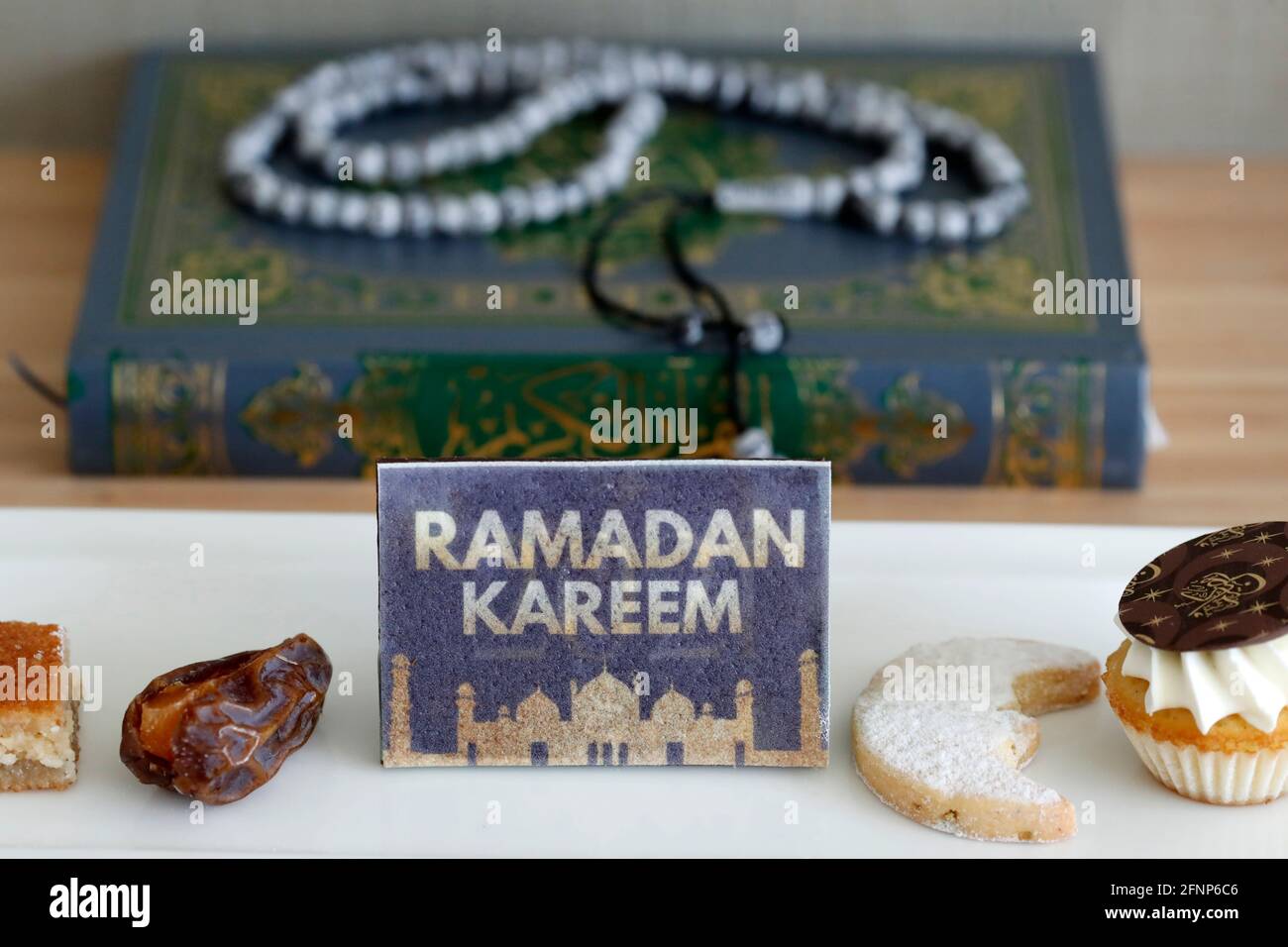 Holy Quran Book With Rosary And Date And Pastries Ramadan Concept Dubai United Arab Emirates Stock Photo Alamy