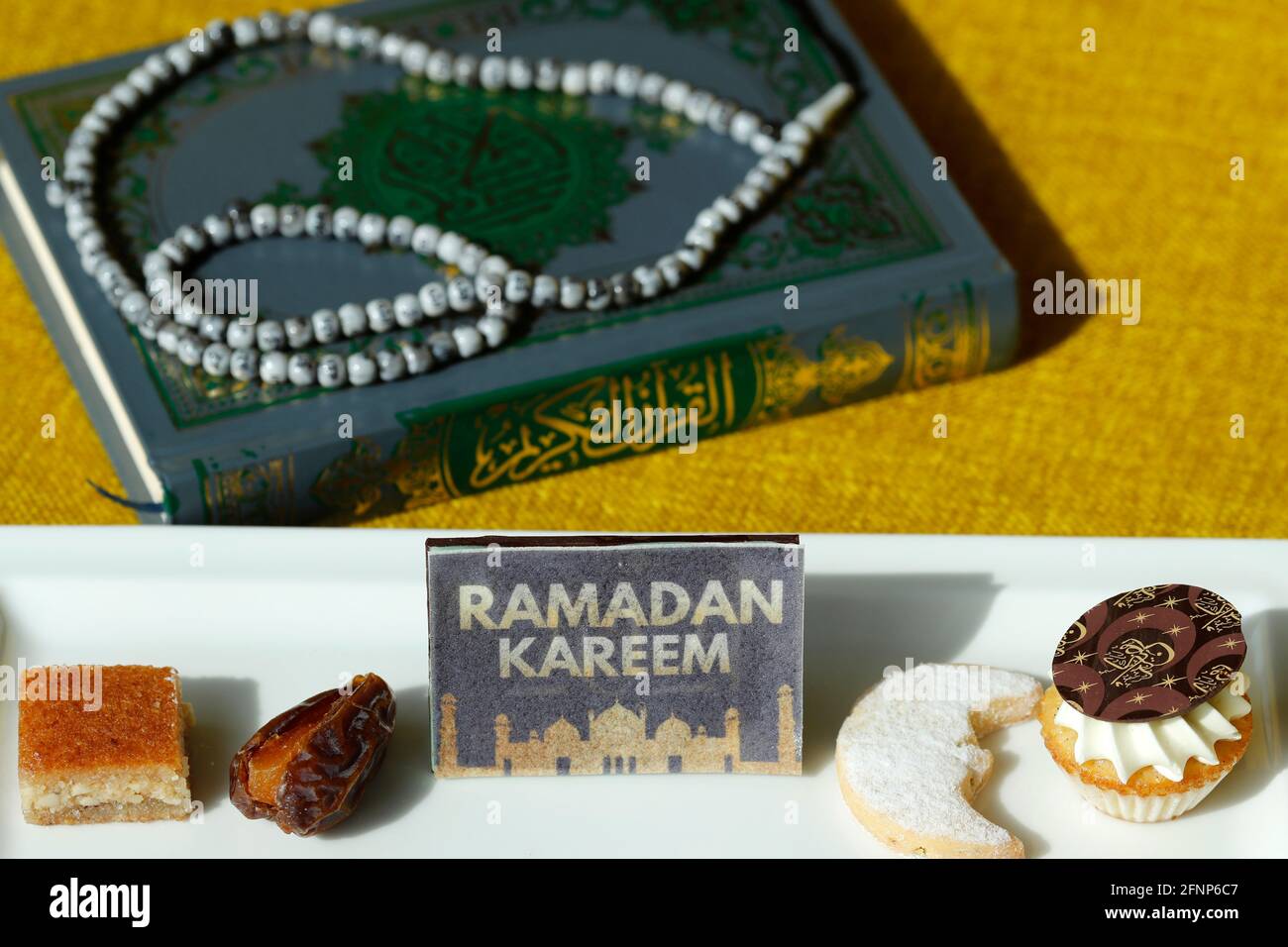 Holy Quran Book With Rosary And Date And Pastries Ramadan Concept Dubai United Arab Emirates Stock Photo Alamy