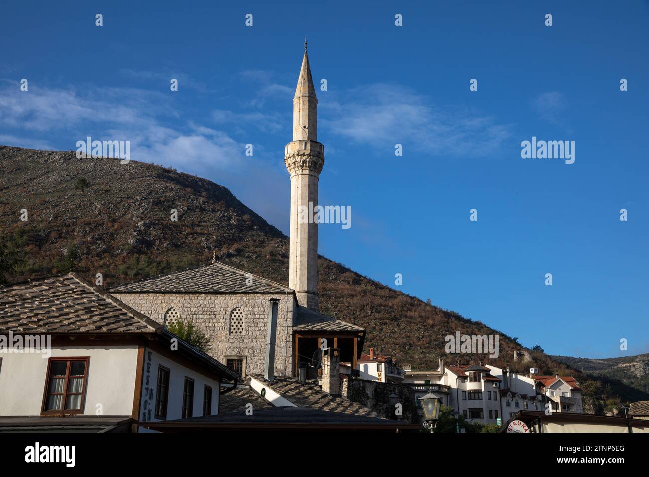 Buildings and minaret in Mostar, Herzegovina, Bosnia & Herzegovina. Stock Photo