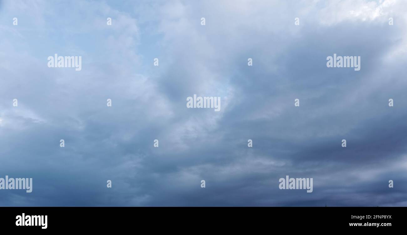 A Storm clouds at dusk, moody cloud sky replacement Stock Photo