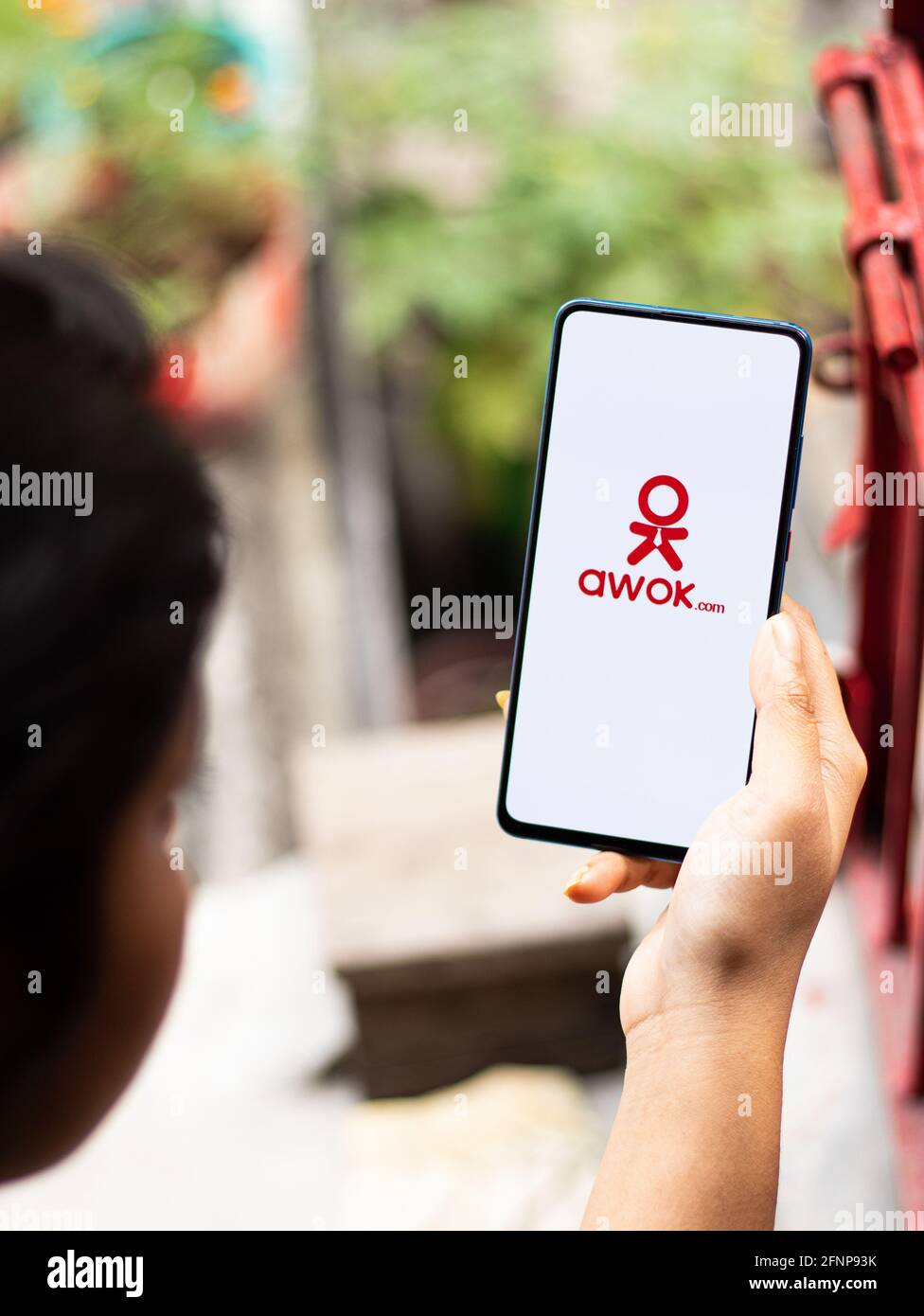 Assam, india - May 18, 2021 : Awok logo on phone screen stock image ...