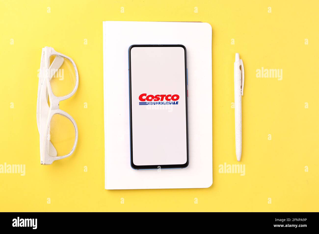 Assam, india - May 18, 2021 : Costco logo on phone screen stock image. Stock Photo