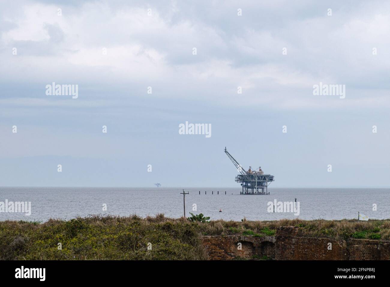 Oil rig in Mobile Bay, Alabama, USA Stock Photo
