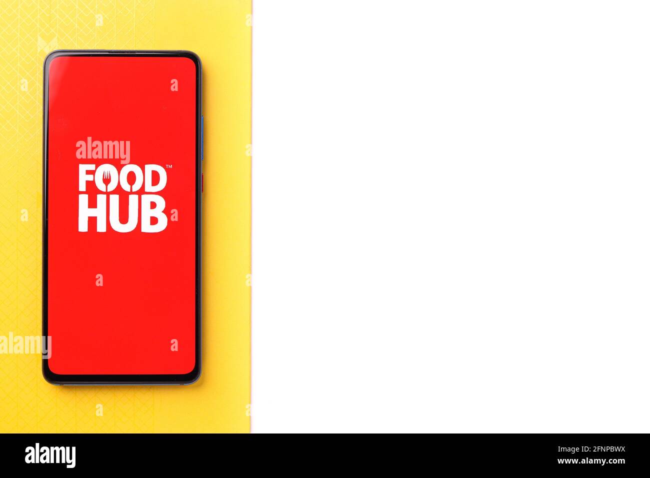 Assam, india - May 18, 2021 : Foodhub logo on phone screen stock image. Stock Photo