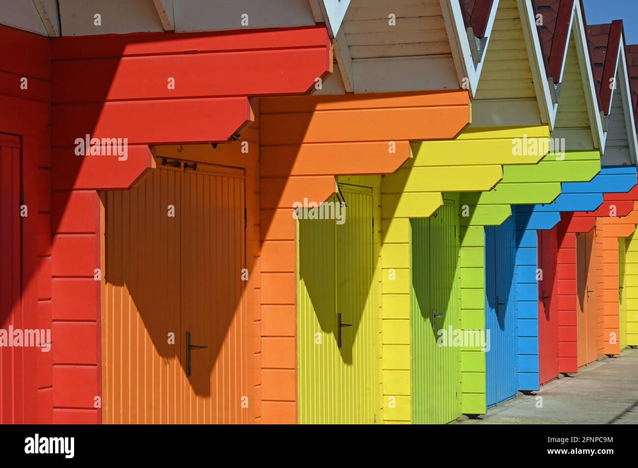 Colourful beach huts at Scarborough, Yorkshire, UK Stock Photo