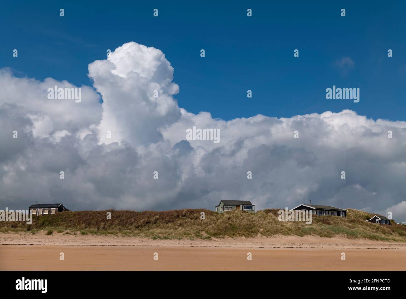 Head in the clouds, weather image from the beach at Newton by the sea Northumberland, UK. Stock Photo
