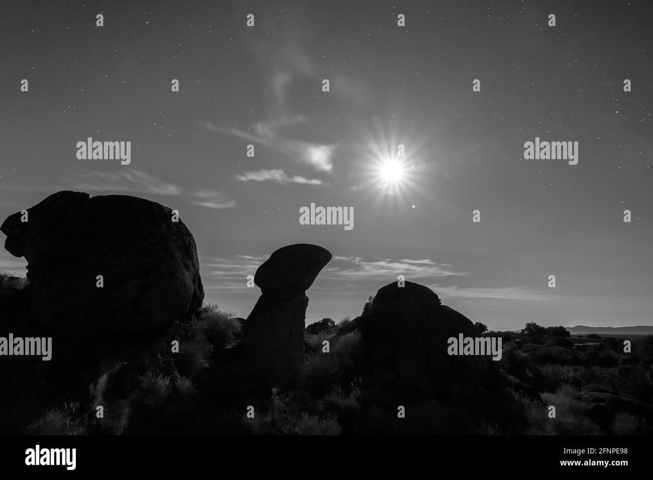 Night landscape with moon in the Barruecos Natural Area. Extremadura. Spain. Stock Photo