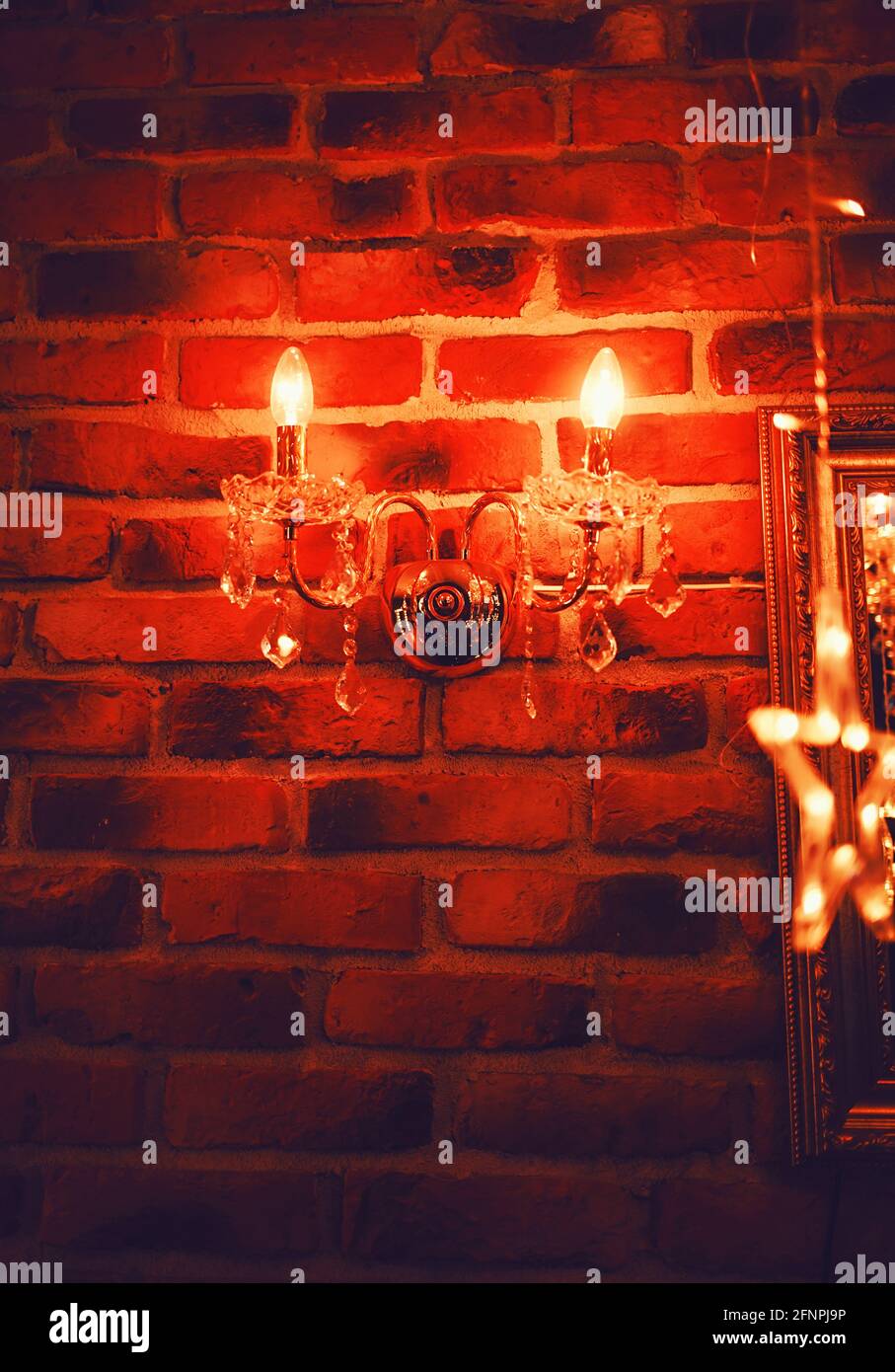 Vintage hanging lights on brick wall Stock Photo Alamy