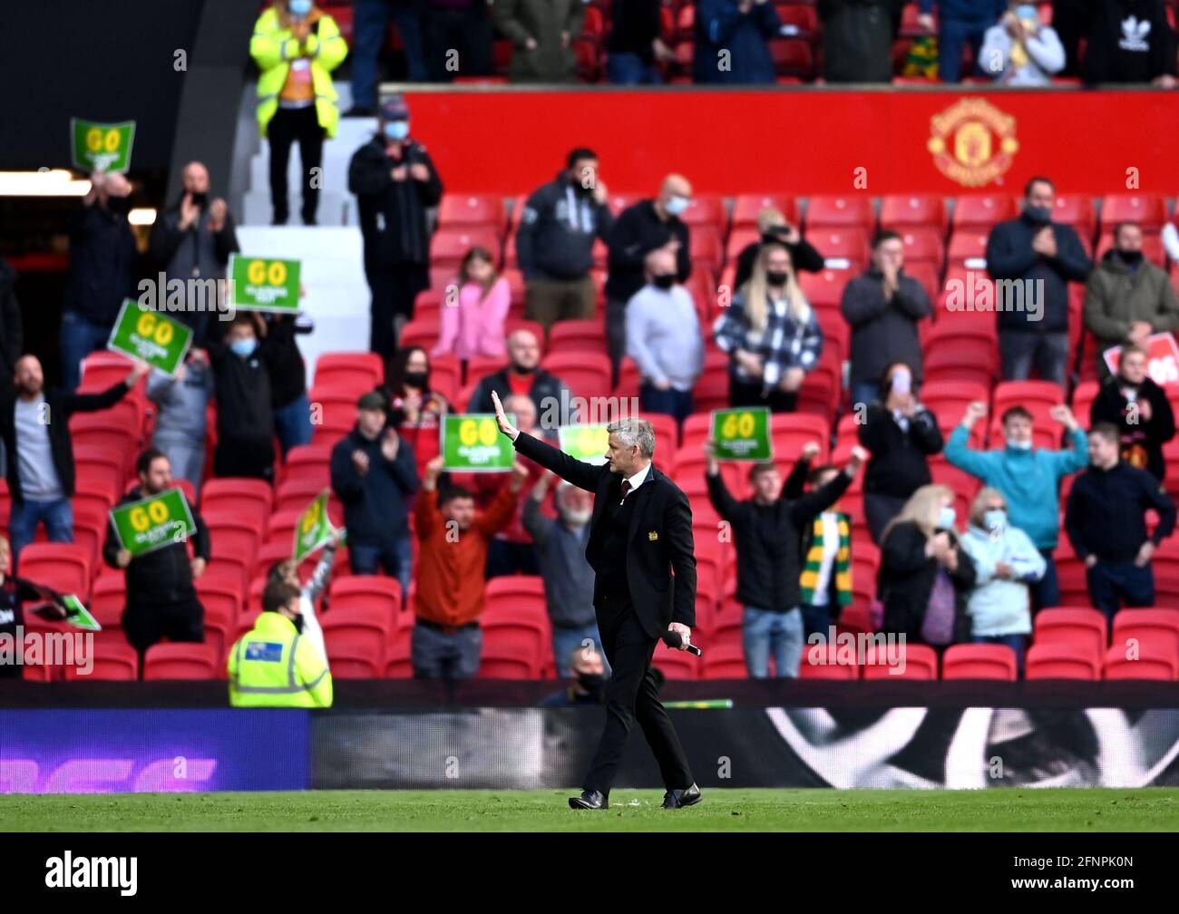 Manchester United manager Ole Gunnar Solskjaer gestures to the fan after the Premier League match at Old Trafford, Manchester. Picture date: Tuesday May 18, 2021. Stock Photo