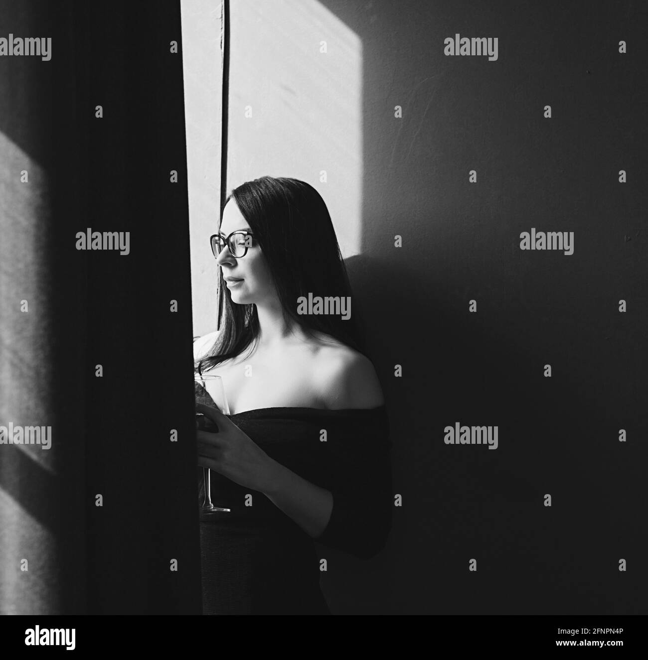 black and white portrait of an elegant woman in the studio Stock Photo ...