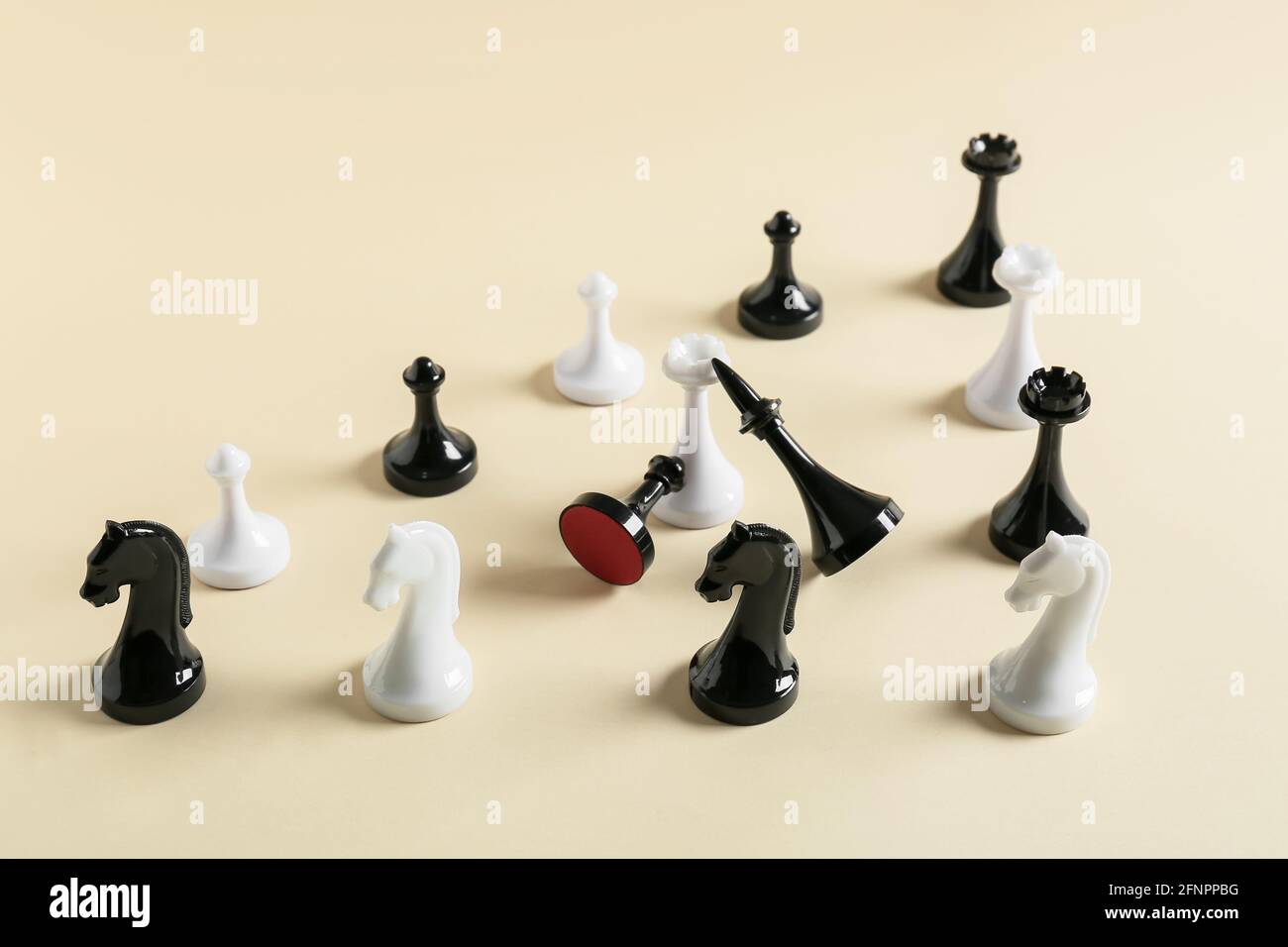Chess pieces on color background Stock Photo - Alamy