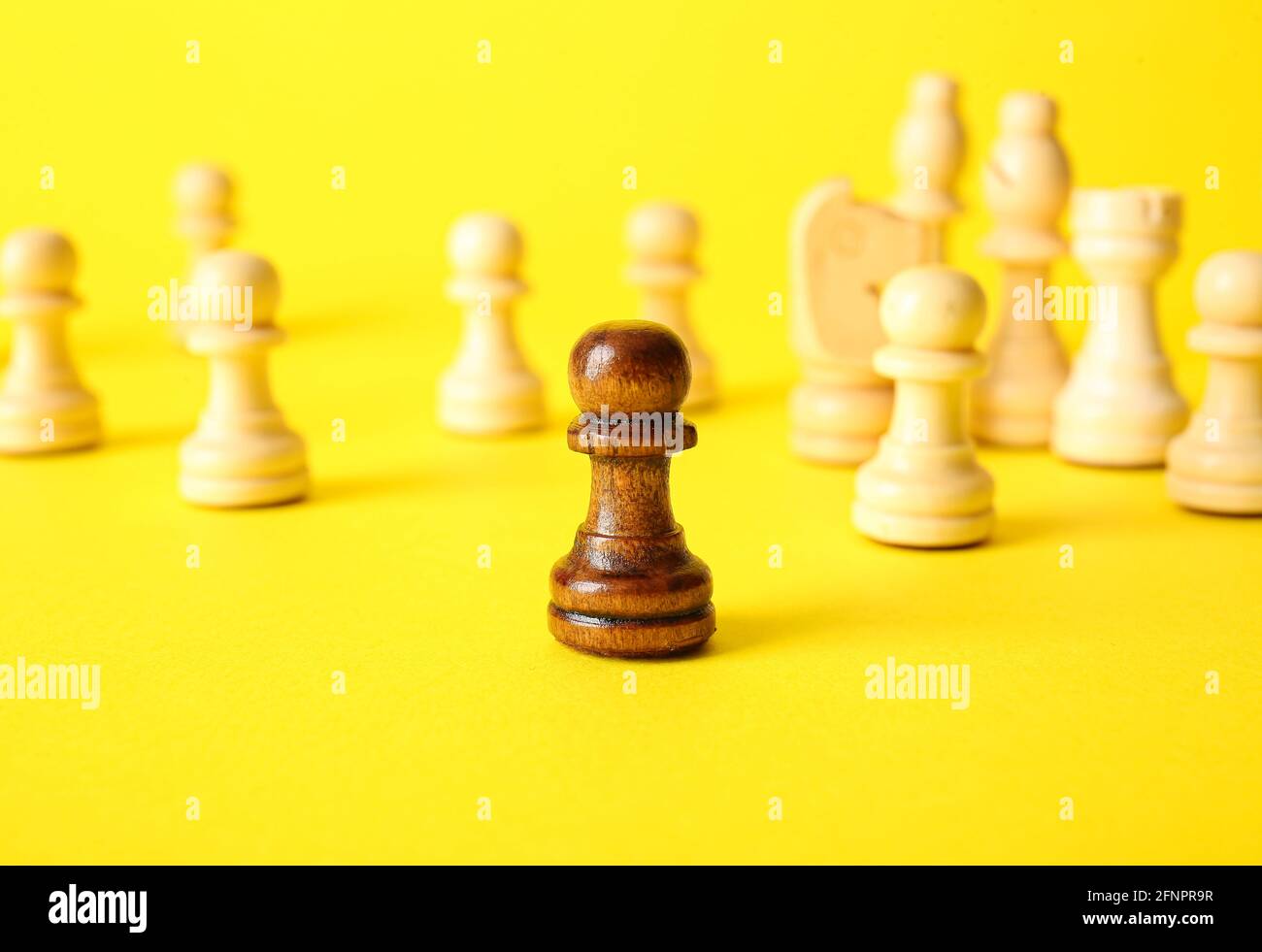 Chess pieces on color background Stock Photo - Alamy