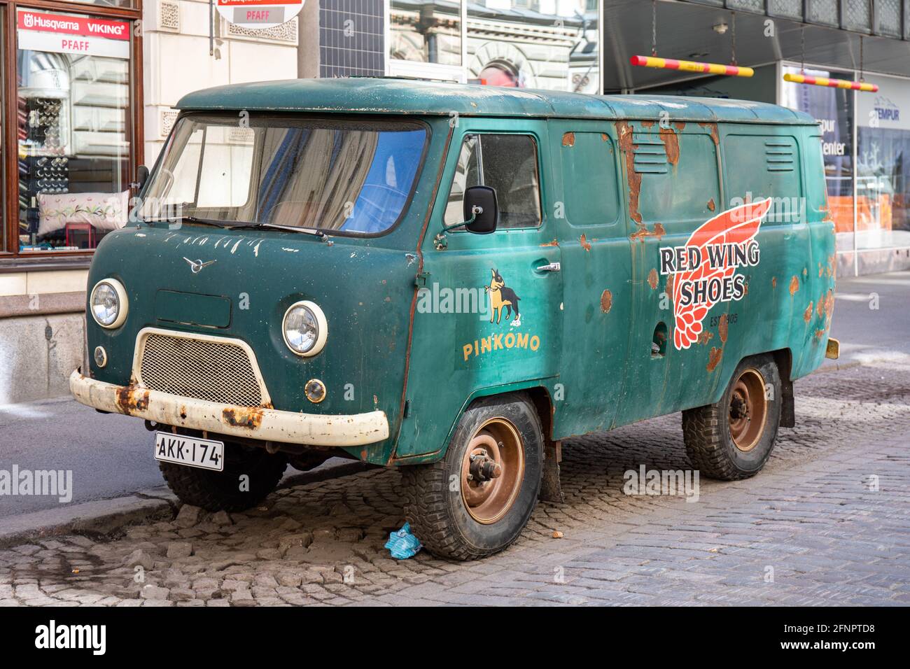 Rusty old green van advertising Red Wing Shoes in Helsinki, Finland Stock  Photo - Alamy