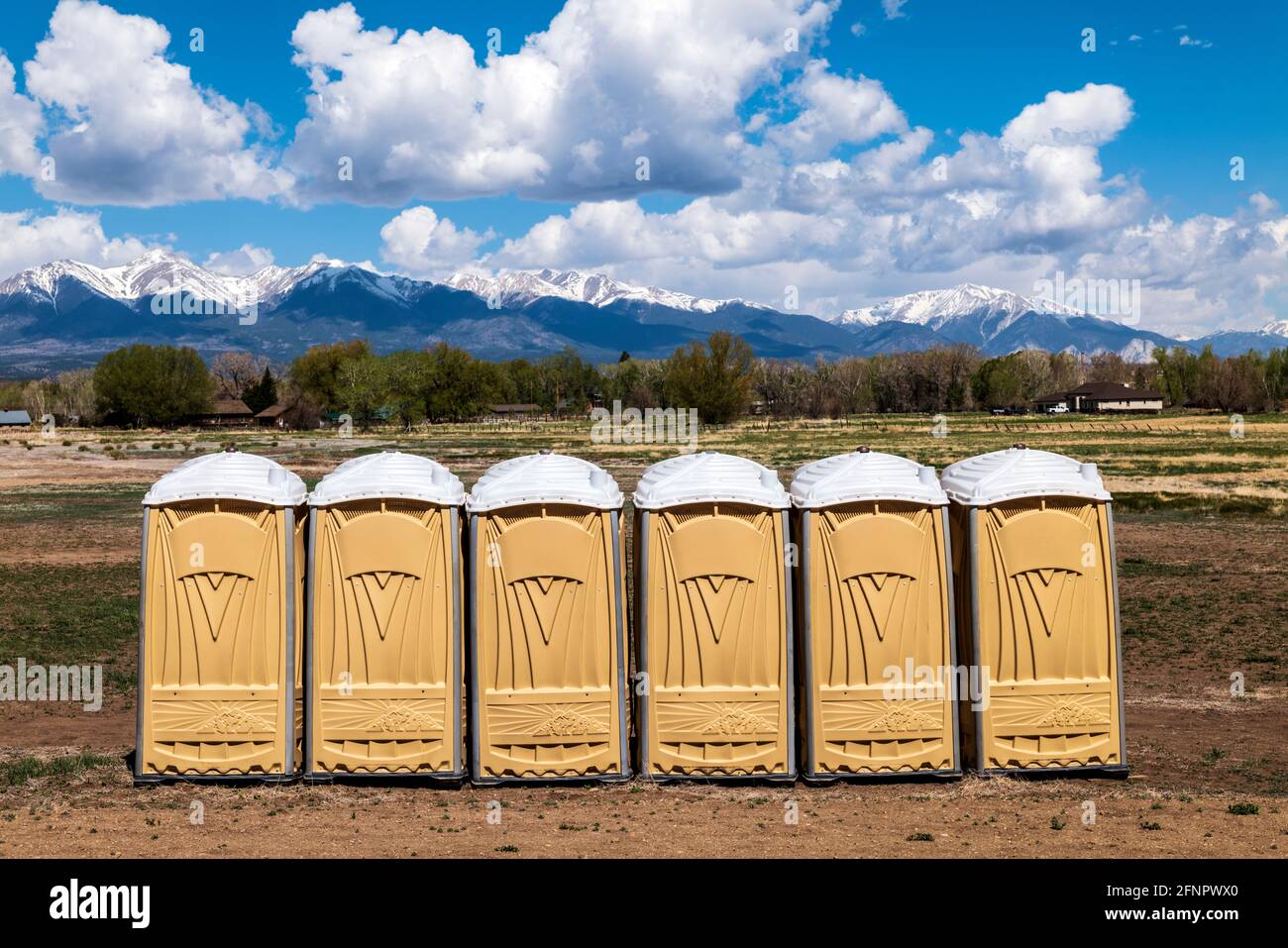Portable toilets - potties set up on central Colorado ranch to accomodate an event Stock Photo