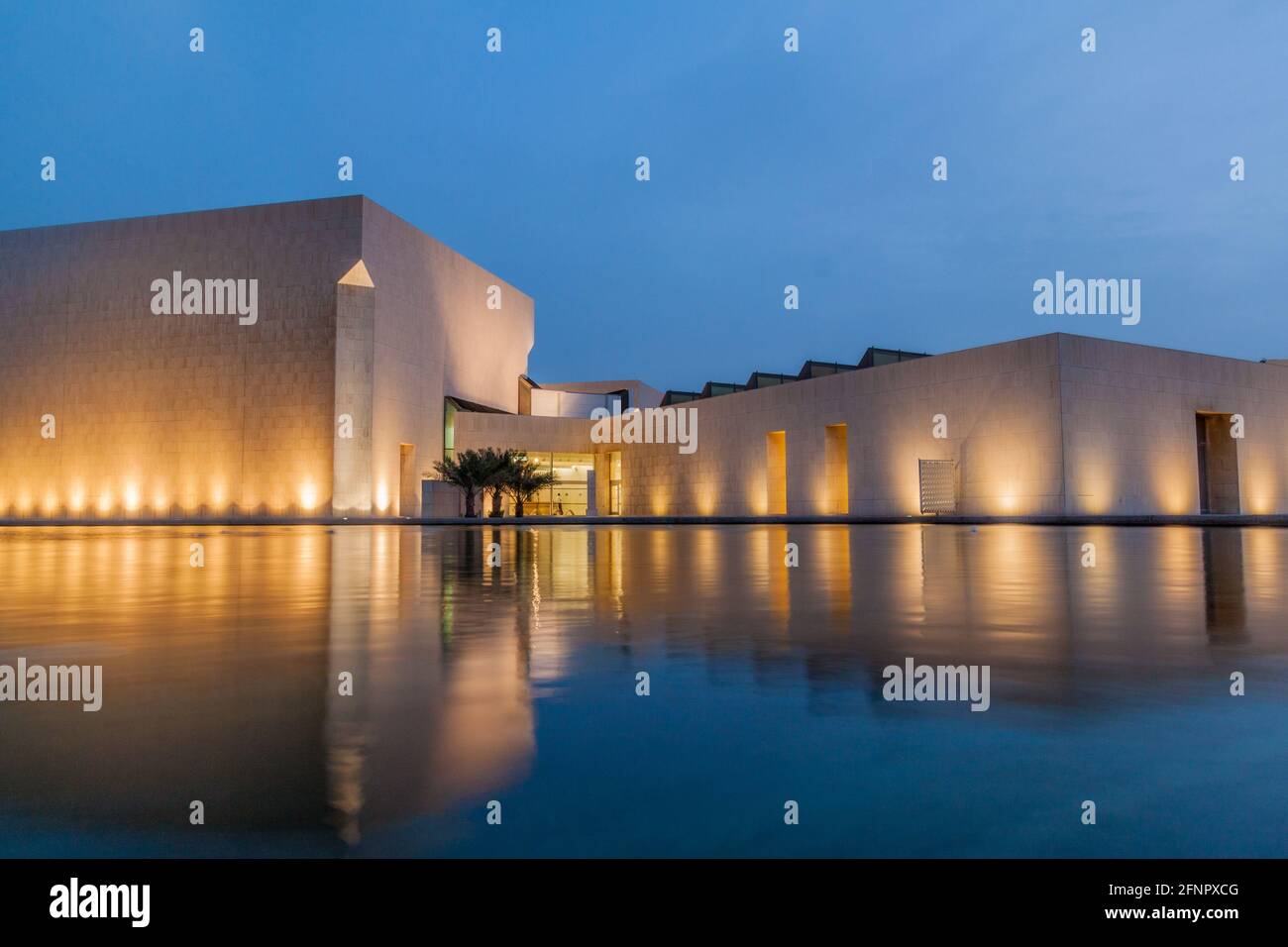 MANAMA, BAHRAIN - MARCH 15, 2017: View of Bahrain National Museum reflecting in a pond. Stock Photo