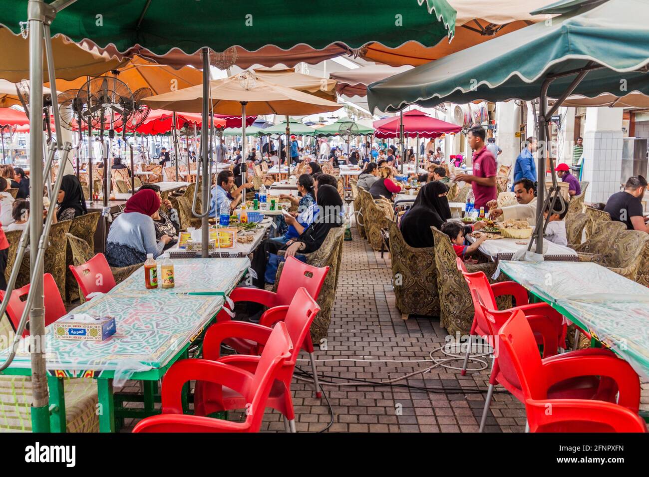 KUWAIT CITY, KUWAIT MARCH 18, 2017 People eat in a food hall of the