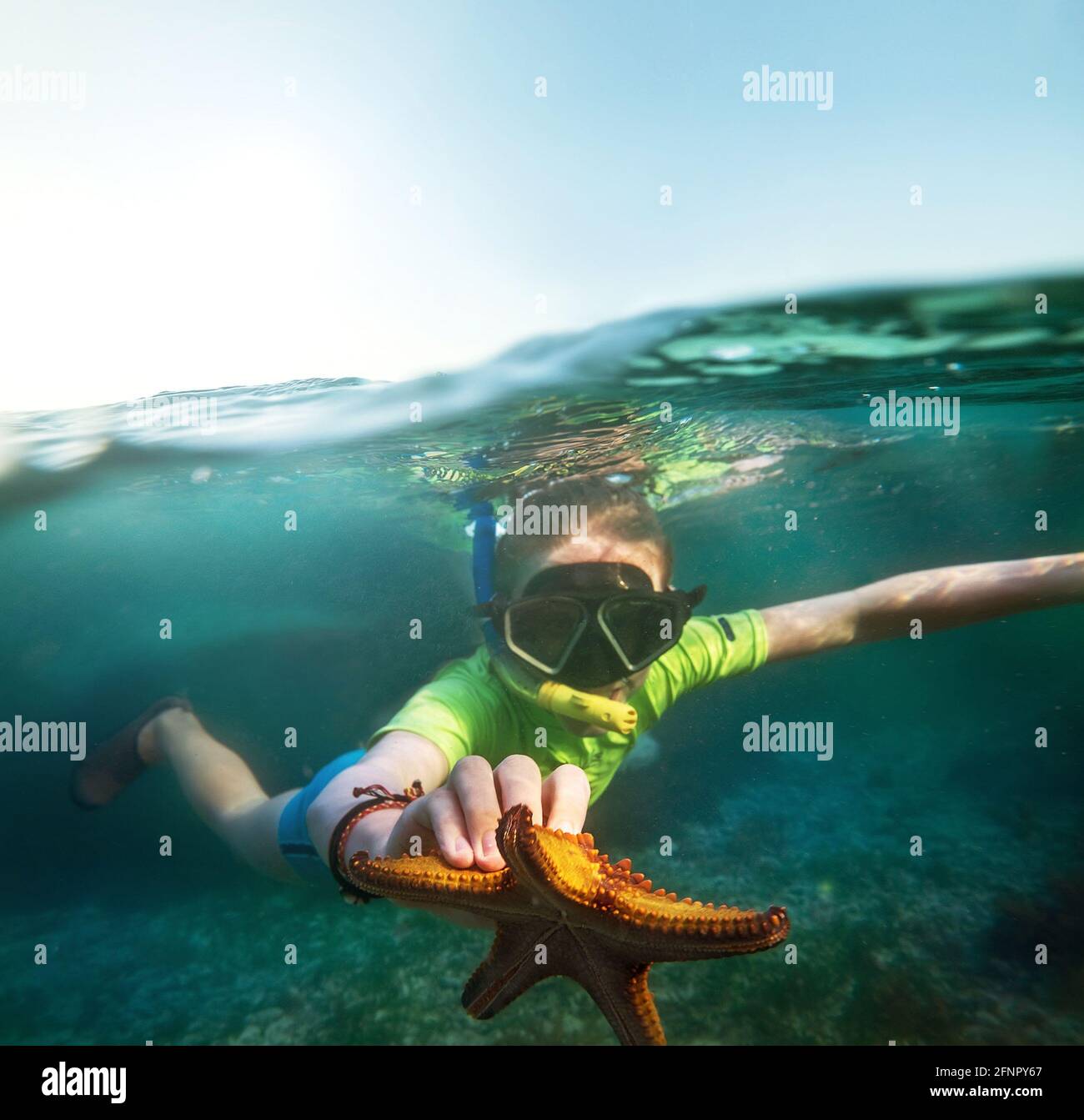 Teenager boy swimming underwater in hi-res stock photography and images ...