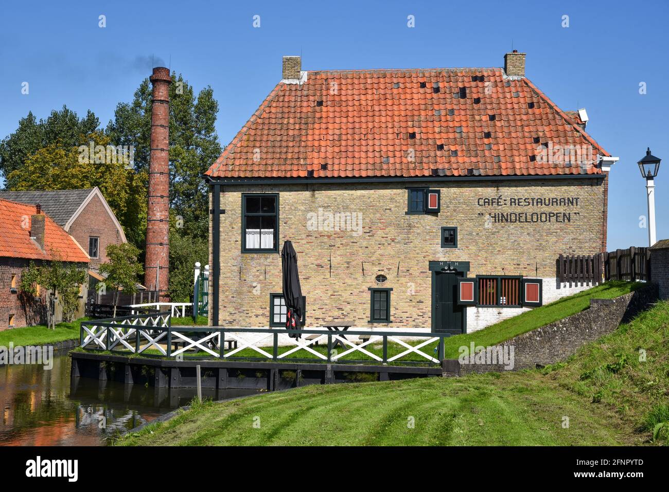 Enkhuizen, the Netherlands - September 2020. The Zuiderzeemuseum; an open air museum at the shore of the IJsselmeer with traditional Dutch fishermen cottages and flat bottomed fishing boats. High quality photo. Stock Photo