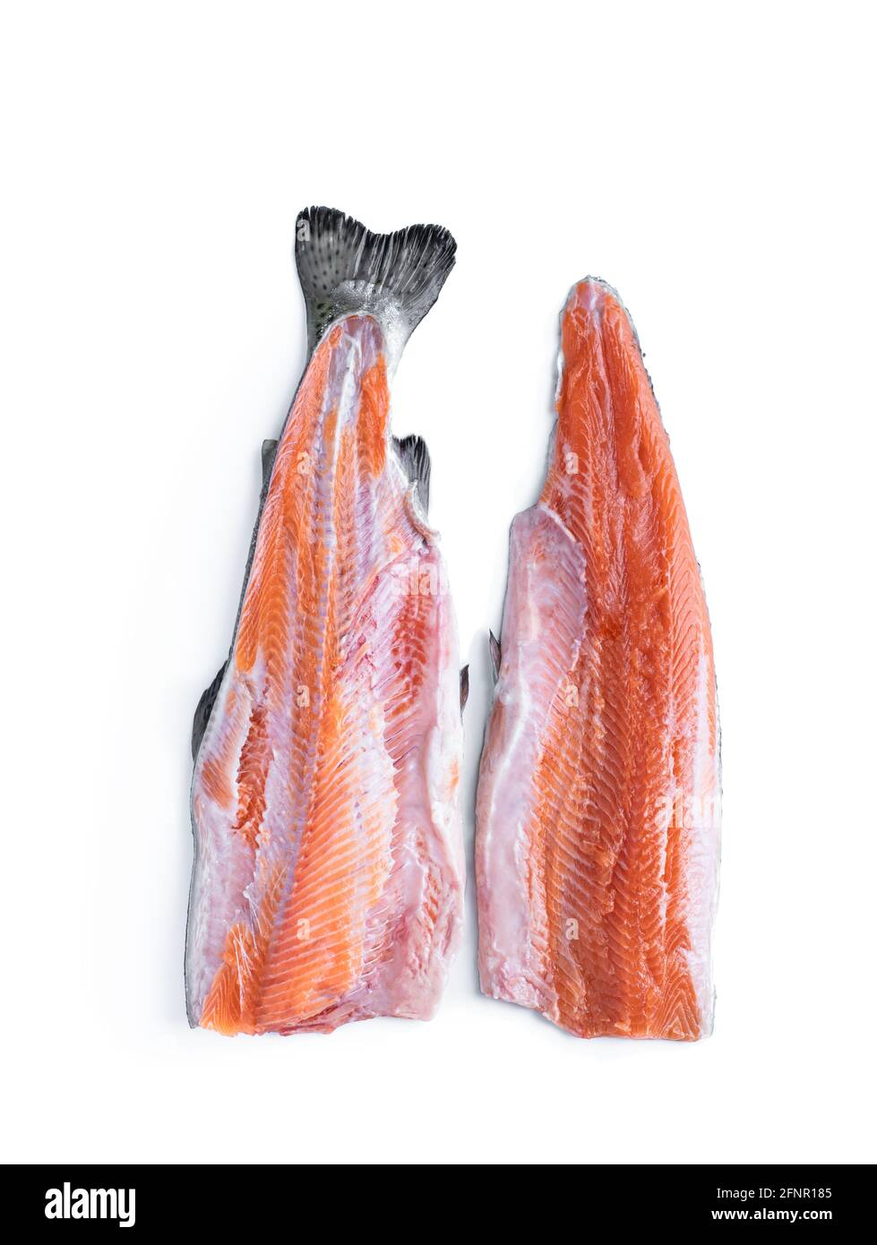 Trout fillet and half with bones isolated on white background Stock