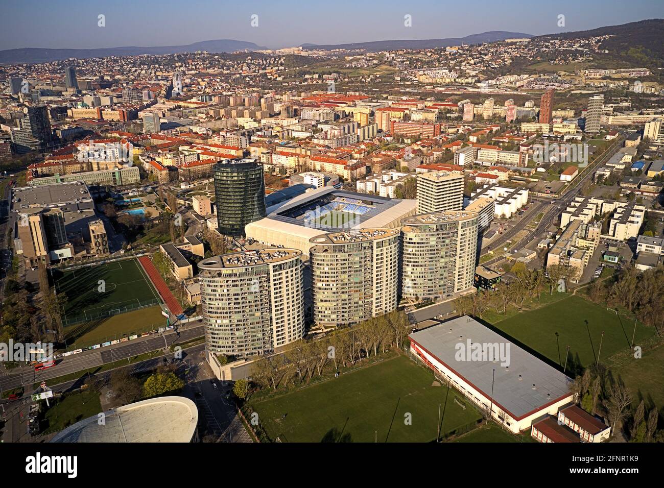 Aerial view in capital Bratislava, III towers residence complex and National Football Stadium Tehelne pole, April 5th 2020 Stock Photo