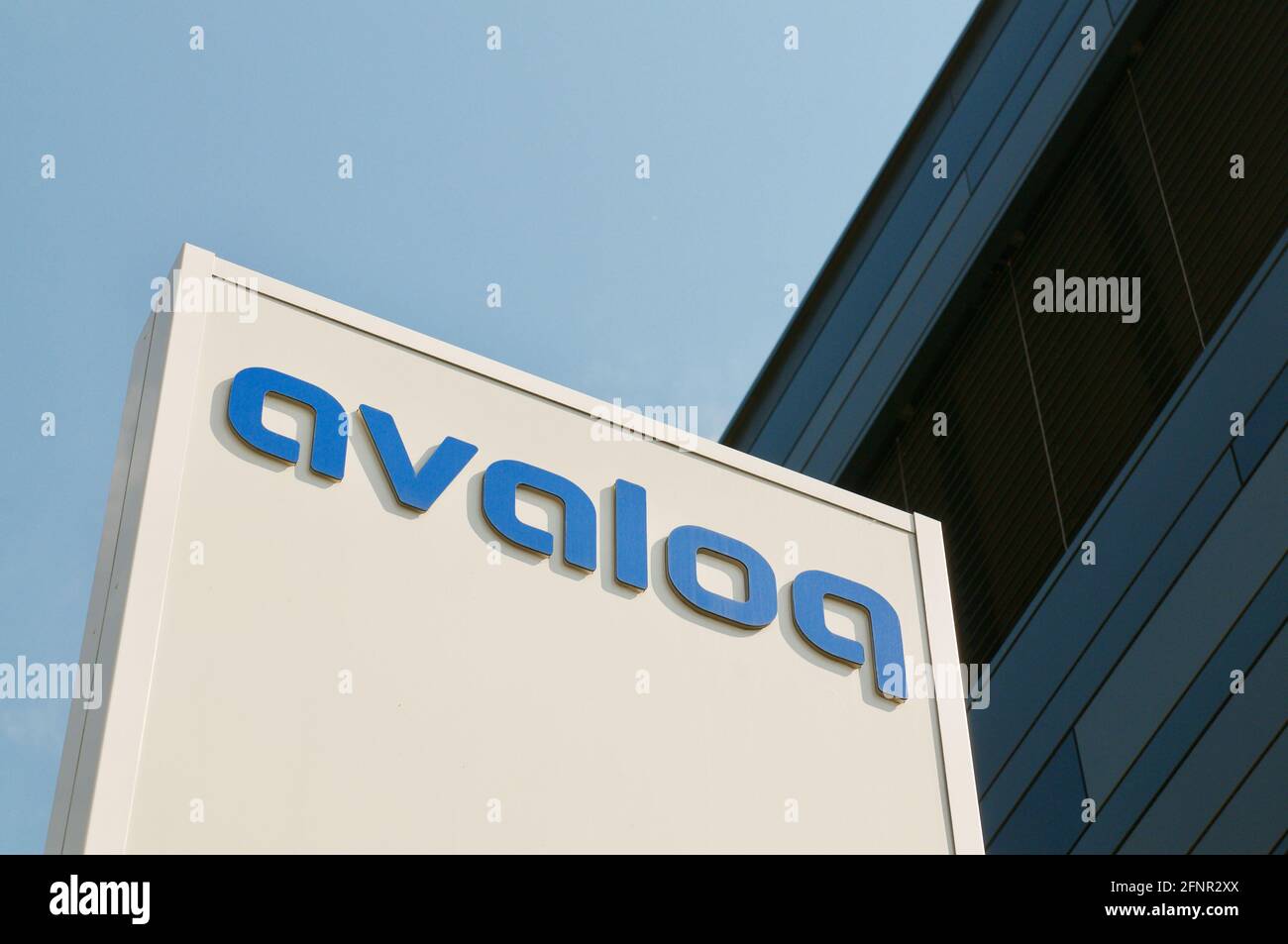 Bioggio, Ticino, Switzerland - 25th April 2021 : Avaloq company sign in front of the headquarters building in Bioggio. Avaloq is a Swiss company that Stock Photo