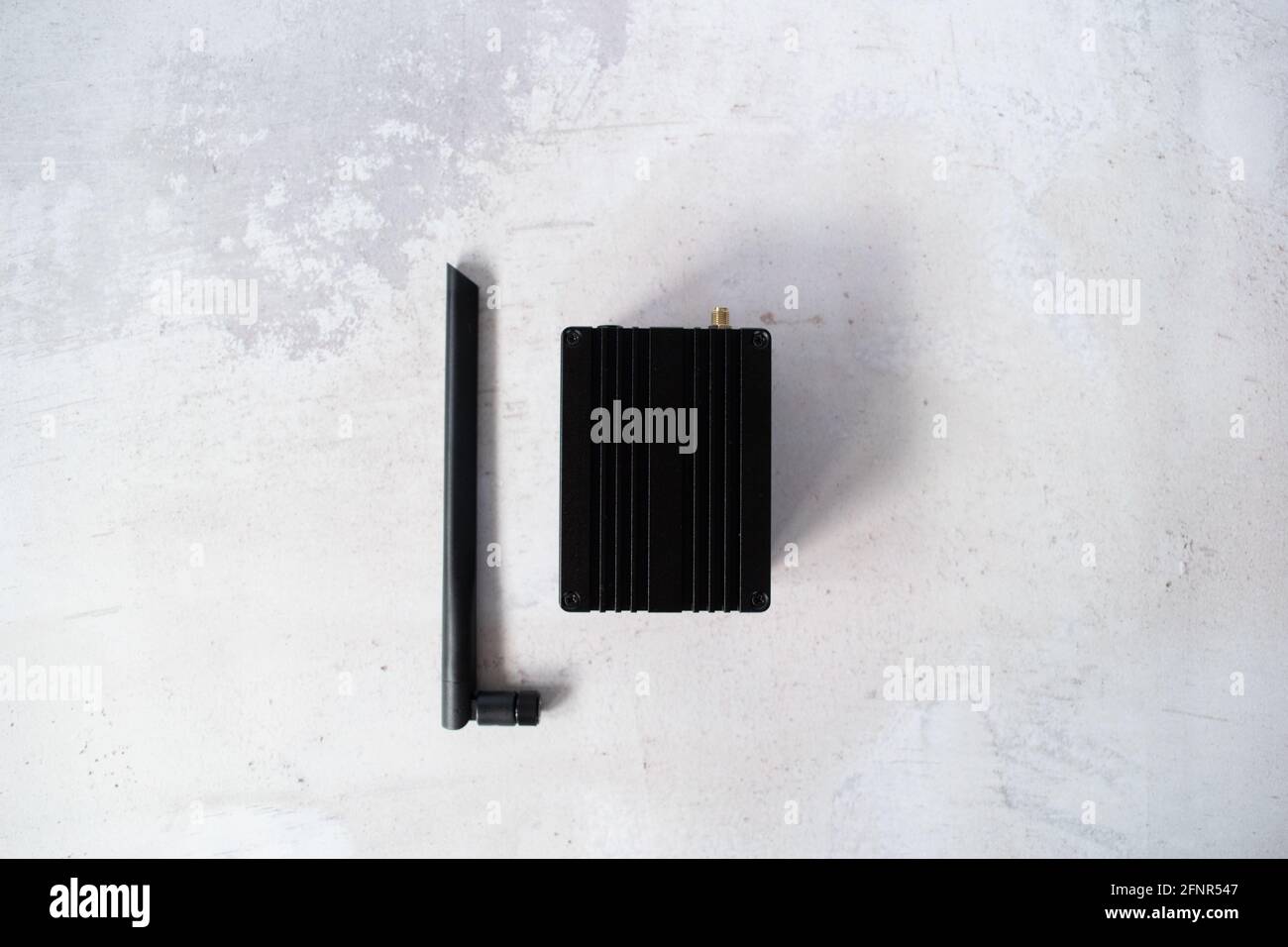 Helium hotspot cryptocurrency miner top-down view of the device. Stock Photo